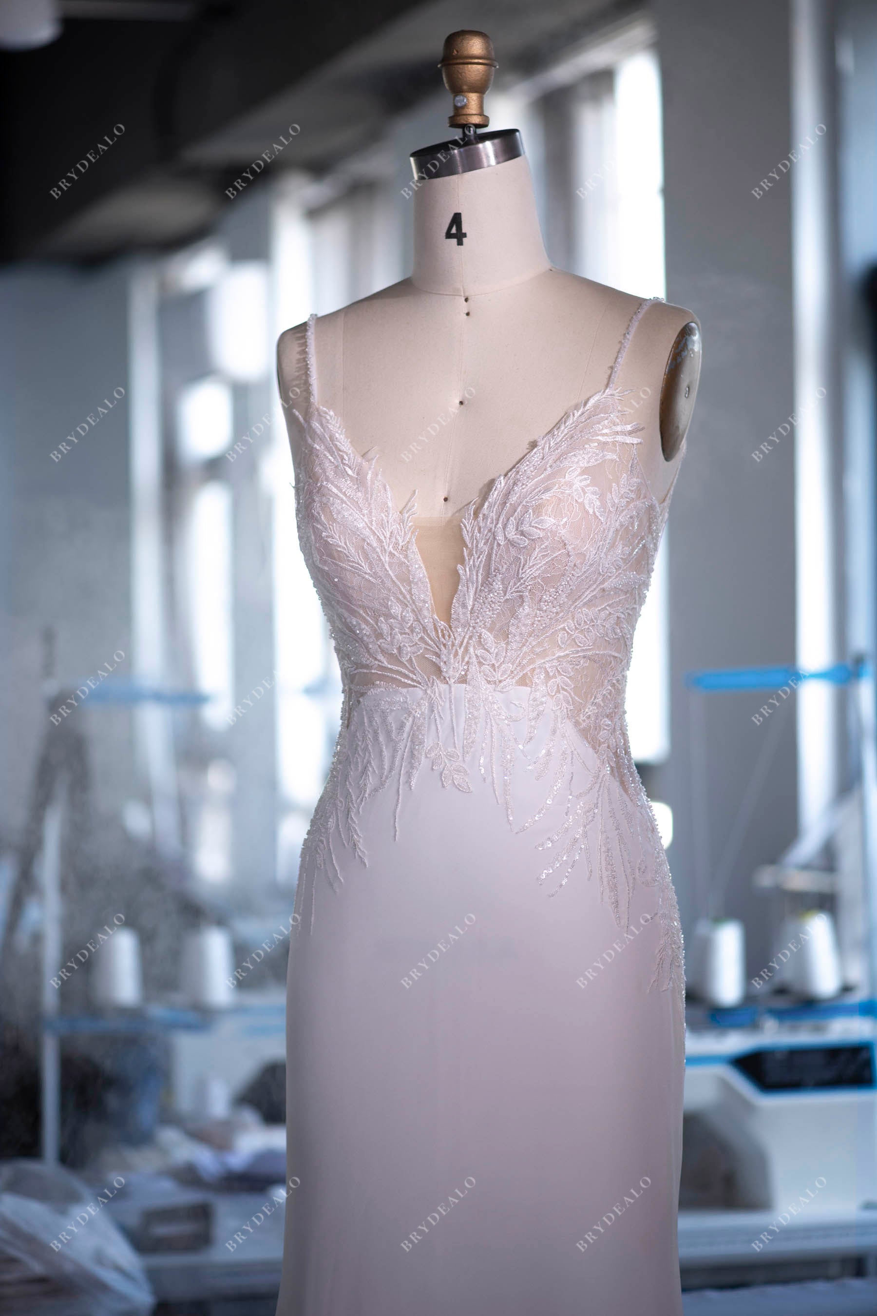 hand-made plunging neck lace crepe bridal gown