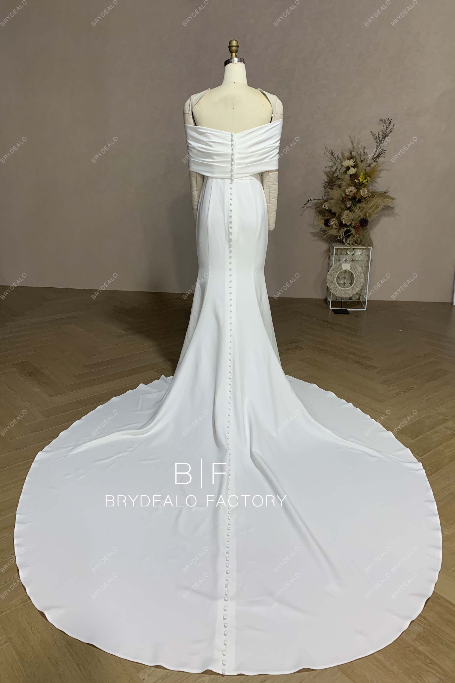 long buttoned back mermaid bridal gown