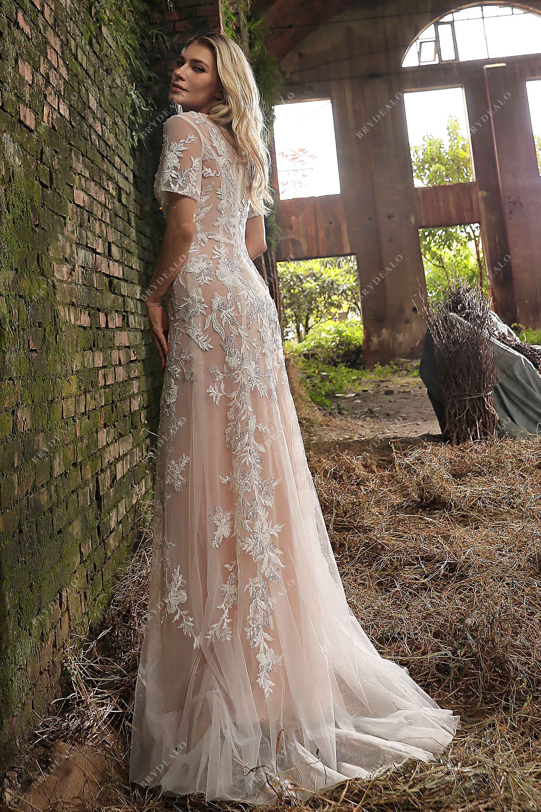 beaded floral appliques cascading sheer flutter sleeves bridal gown