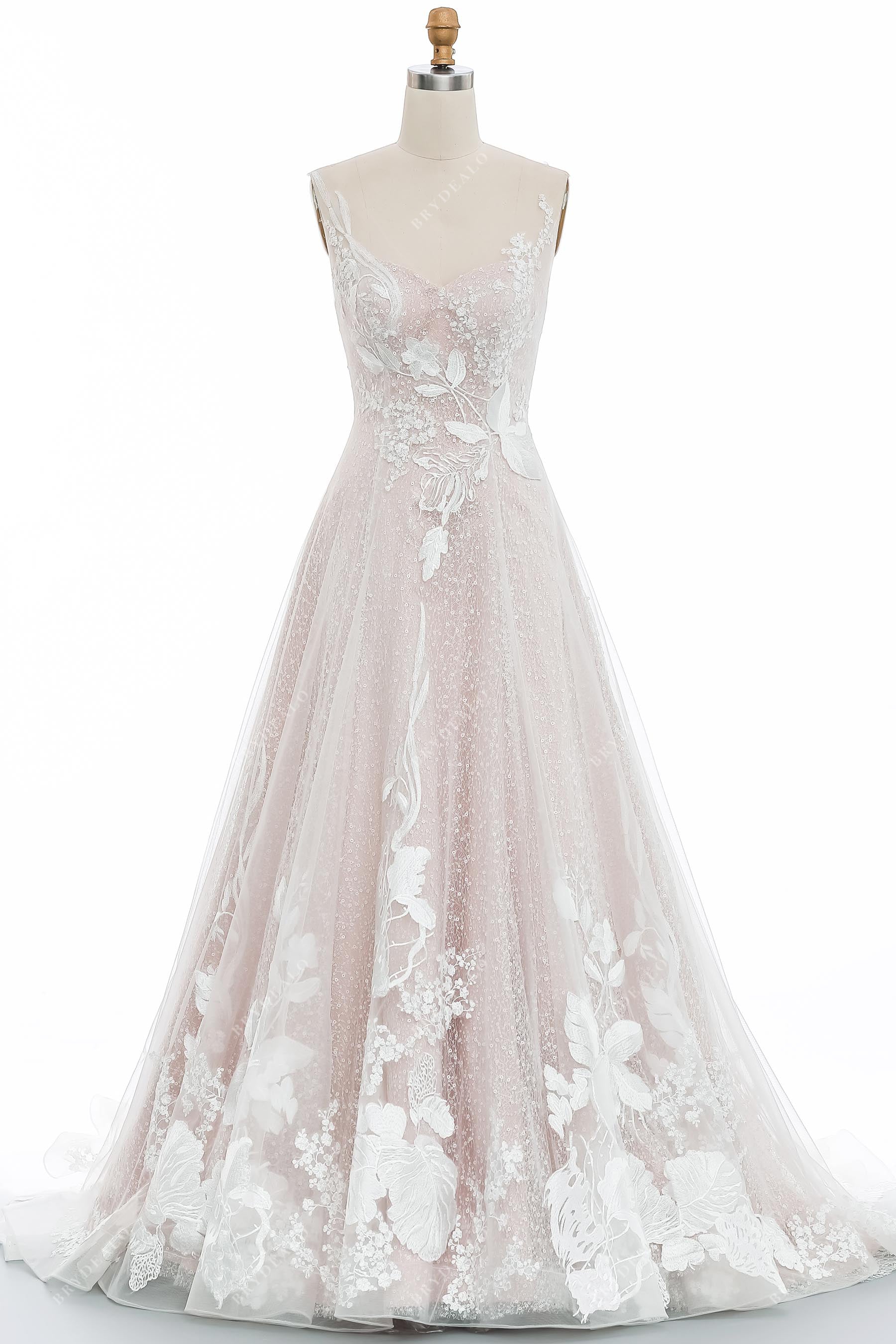 designer illusion strap lace sequin ruffled hem wedding gown