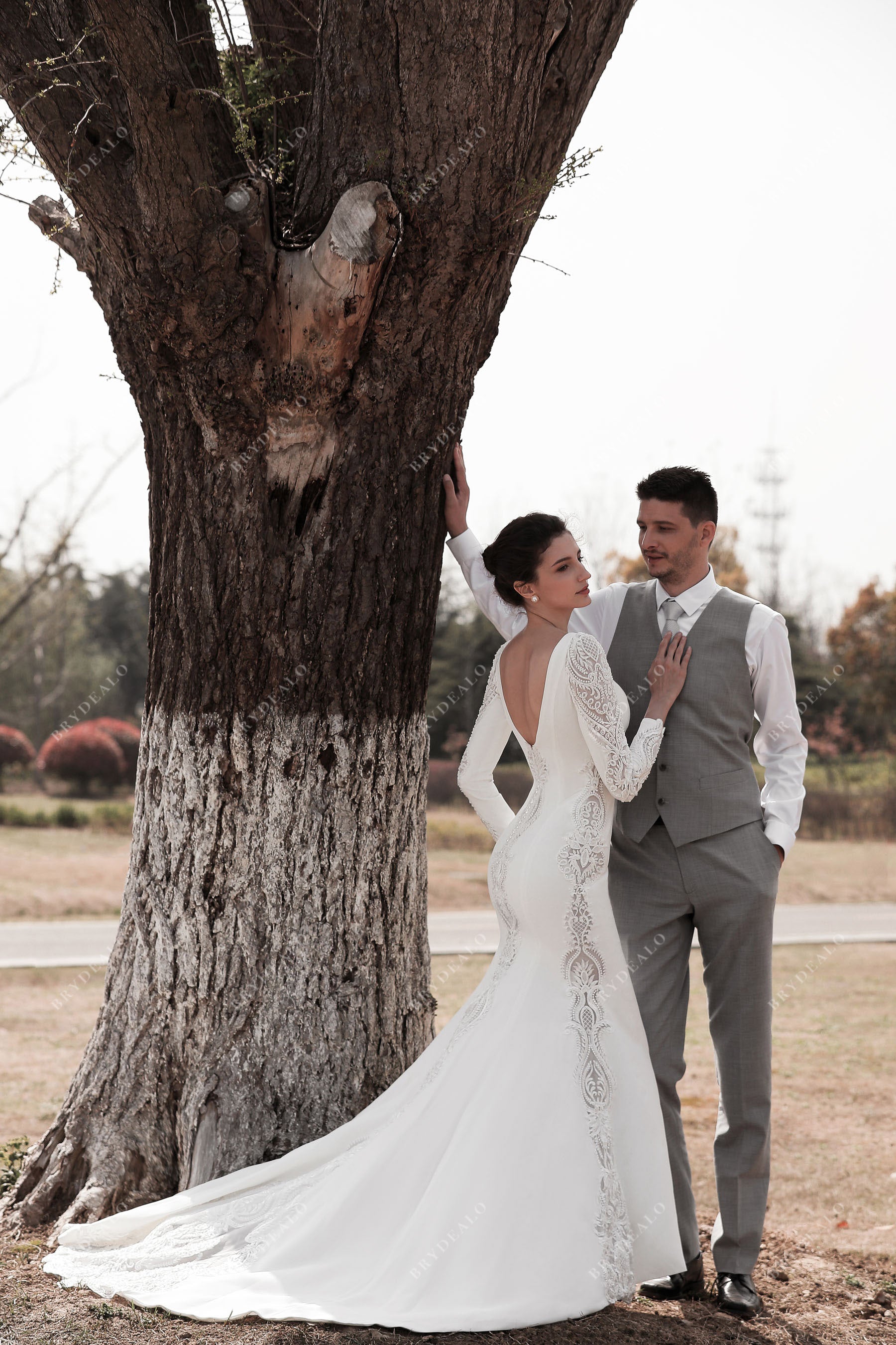 open back chapel train lace crepe wedding gown