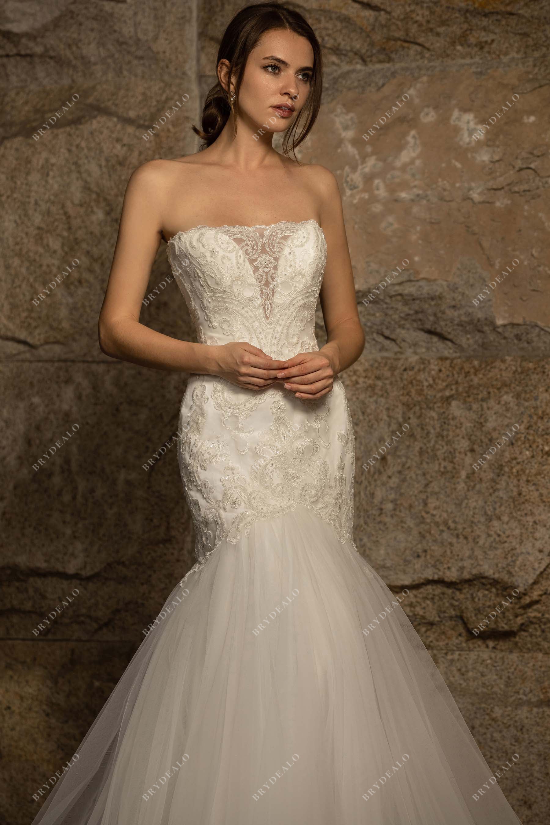 illusion plunging neck trumpet lace bridal gown