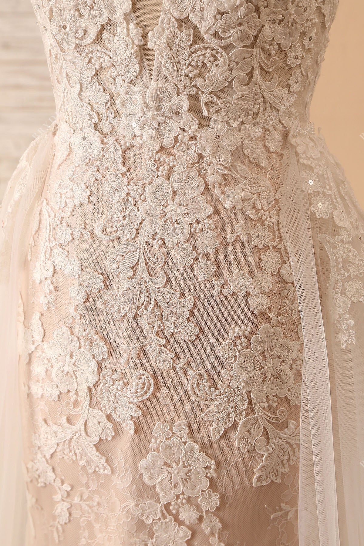 ivory floral lace overlaid champagne wedding gown