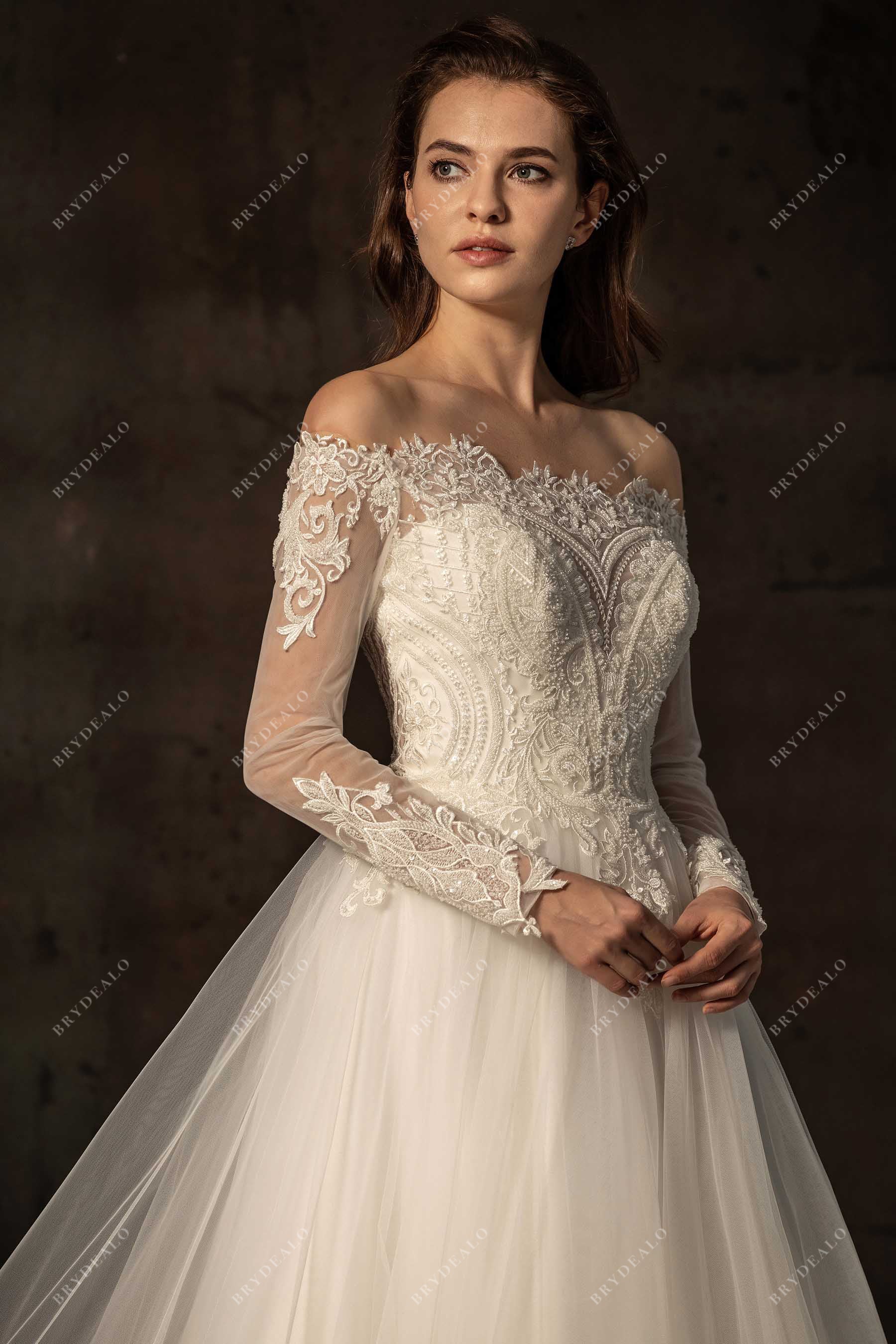 ivory off-shoulder lace bridal gown