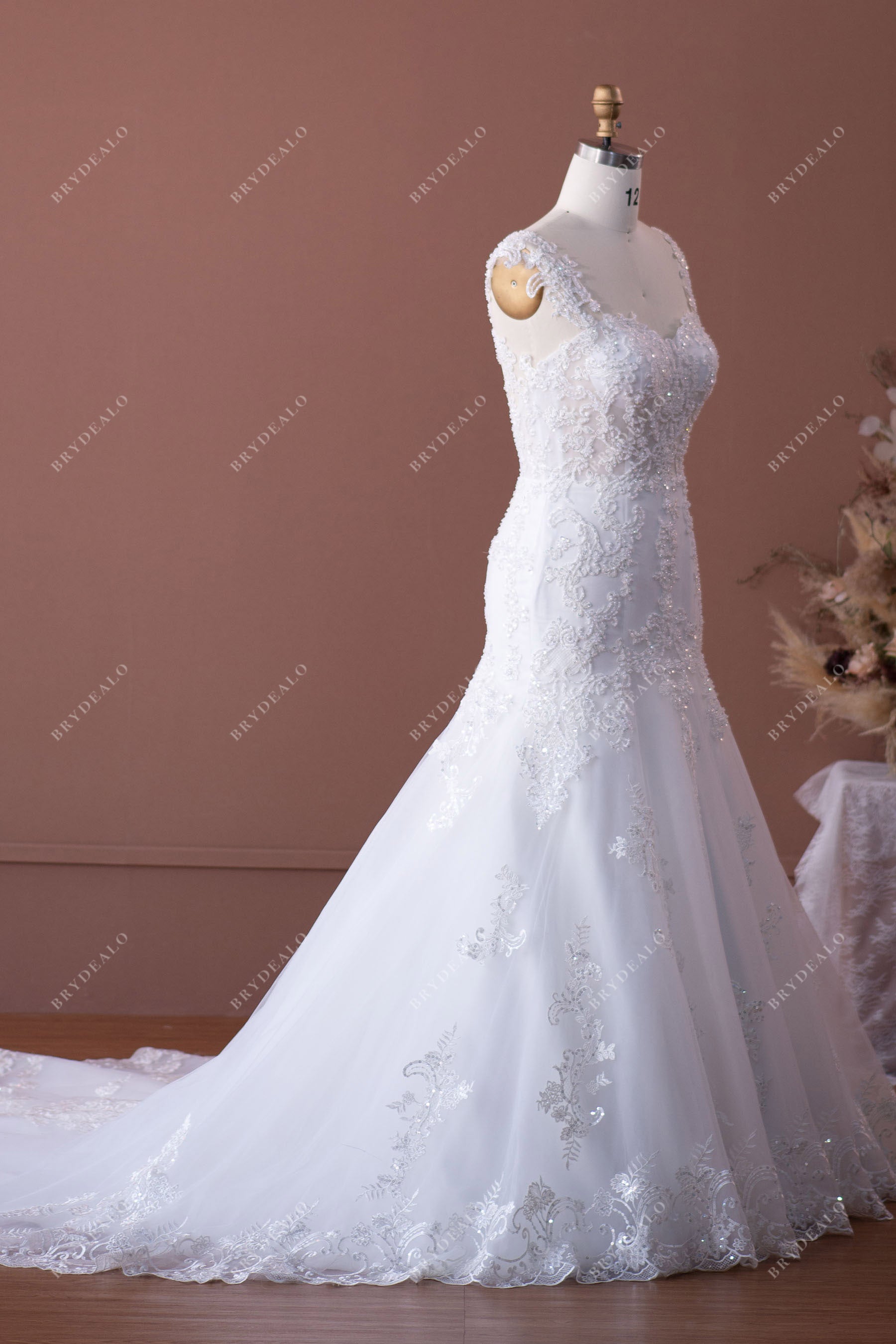sleeveless trumpet lace bridal gown