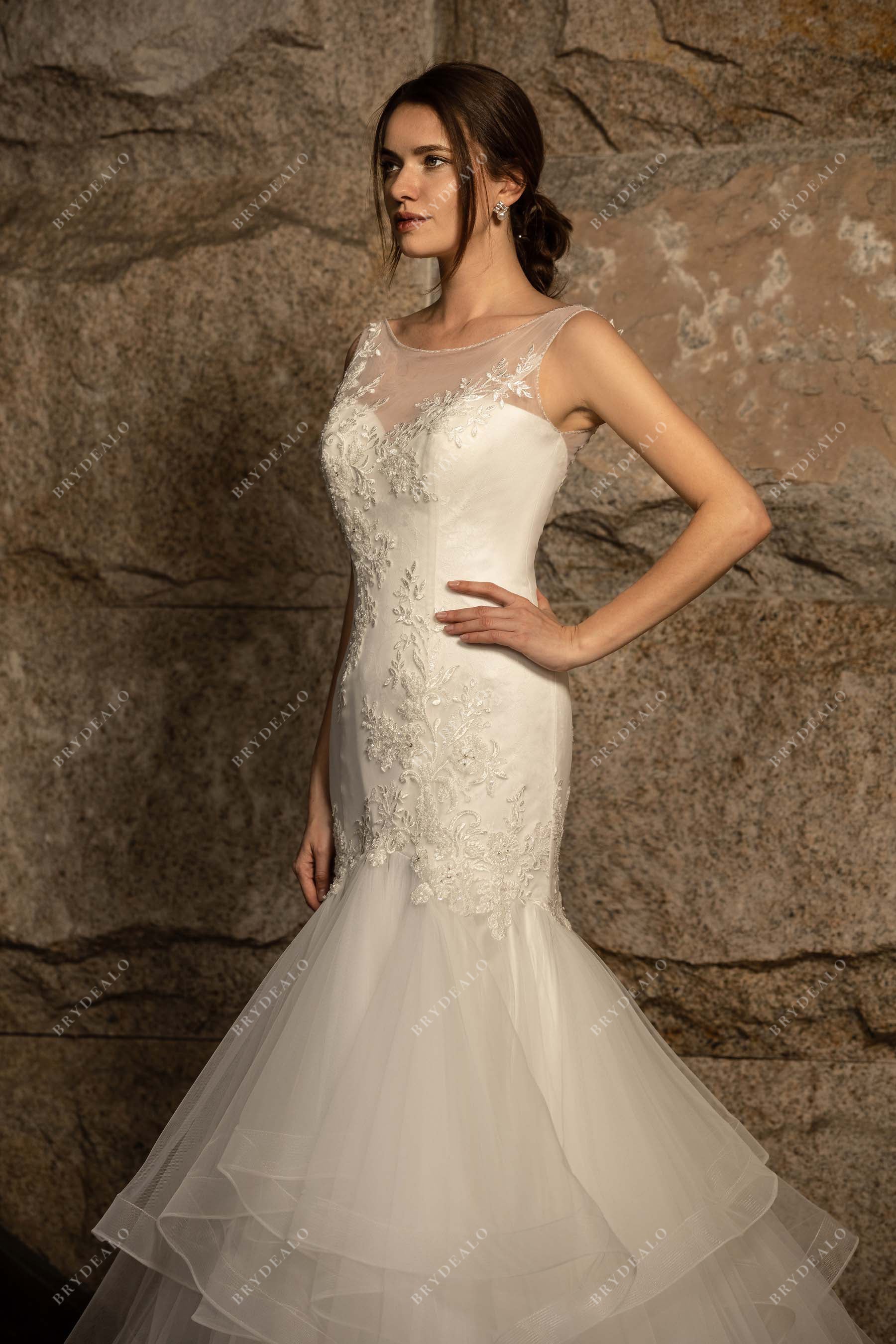 sleeveless beaded lace ruffled tulle wedding gown