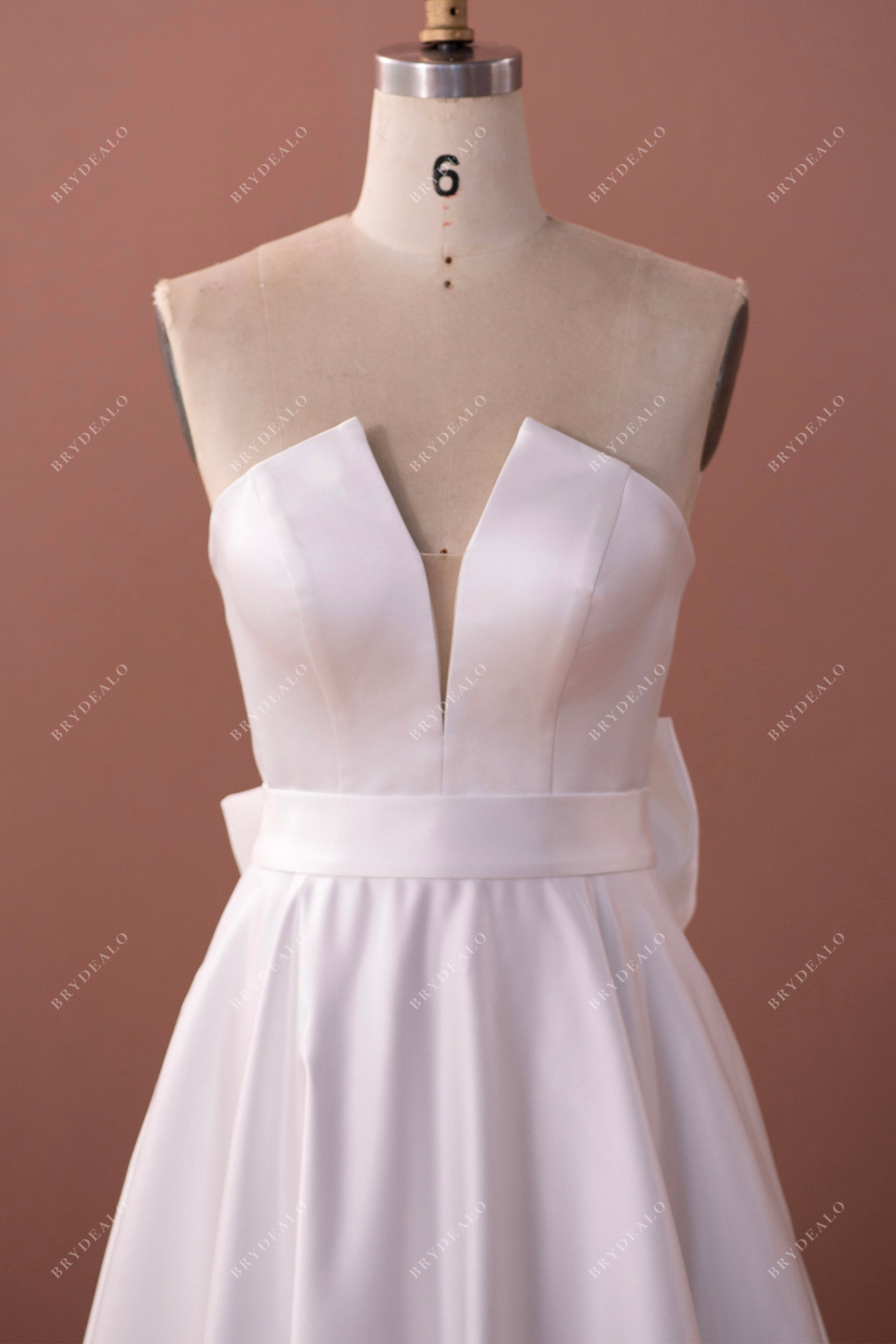 V-cut strapless satin wedding dress