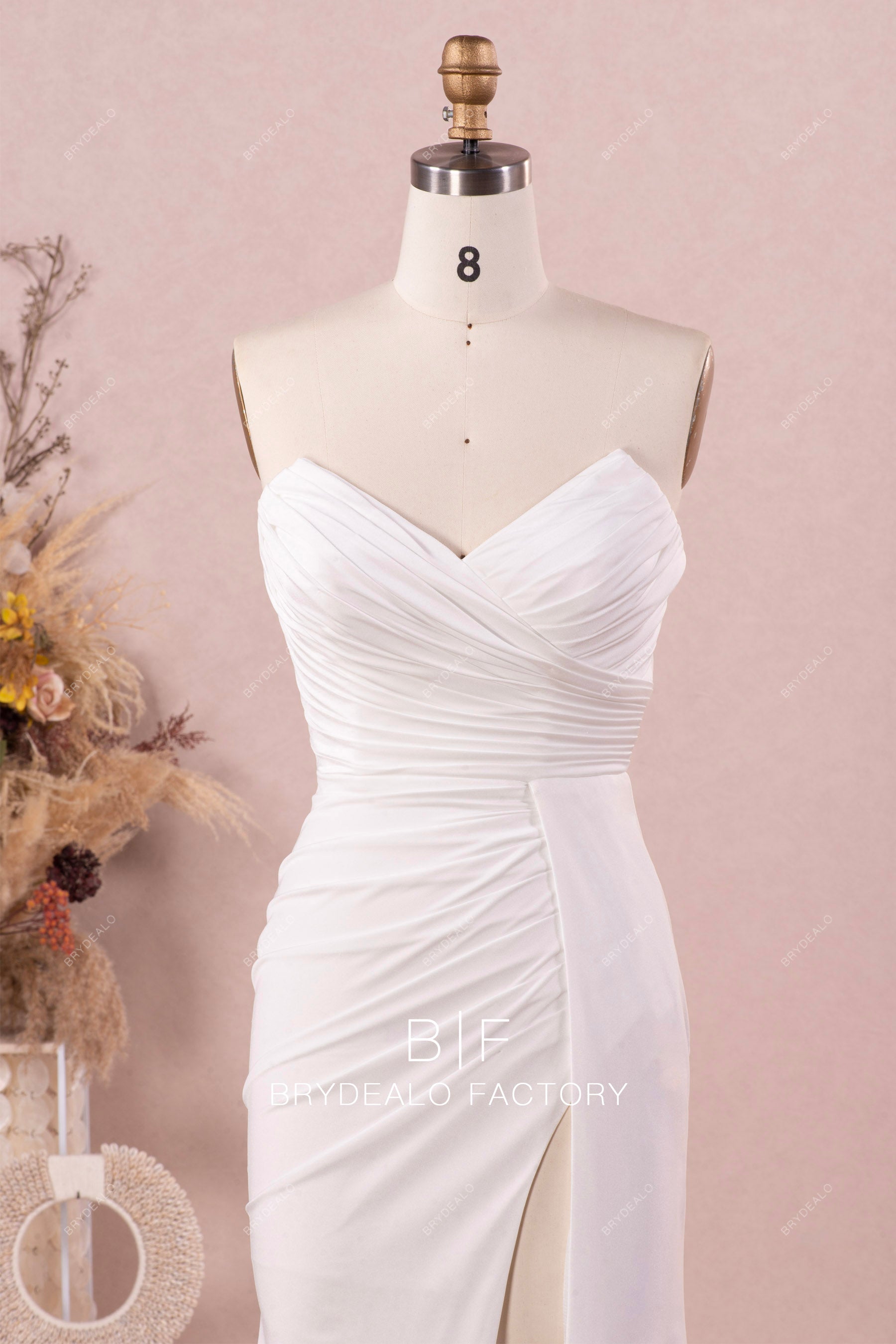 V-cut strapless pleated wedding dress