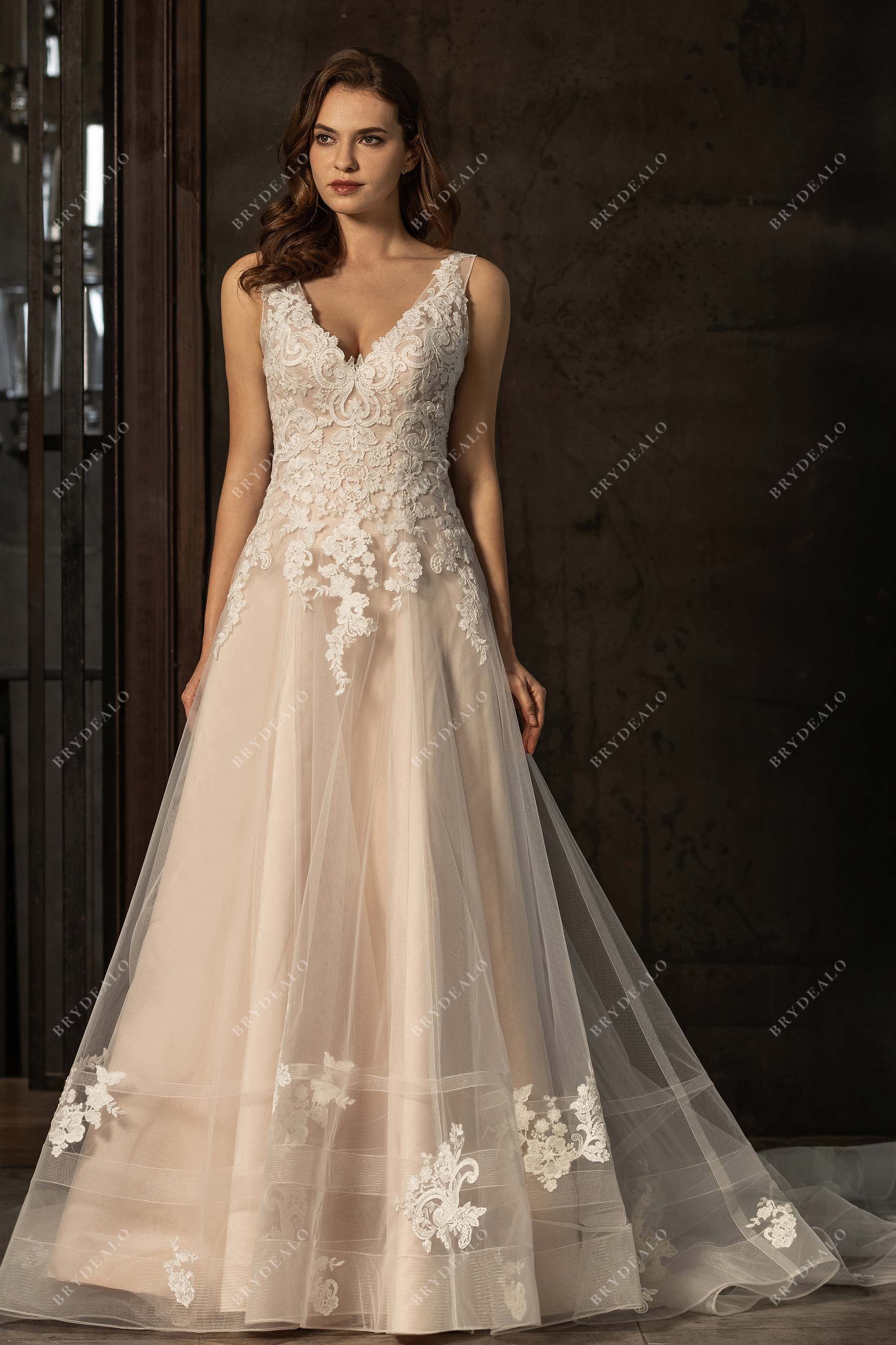 V-neck sleeveless appliqued tulle A-line wedding gown
