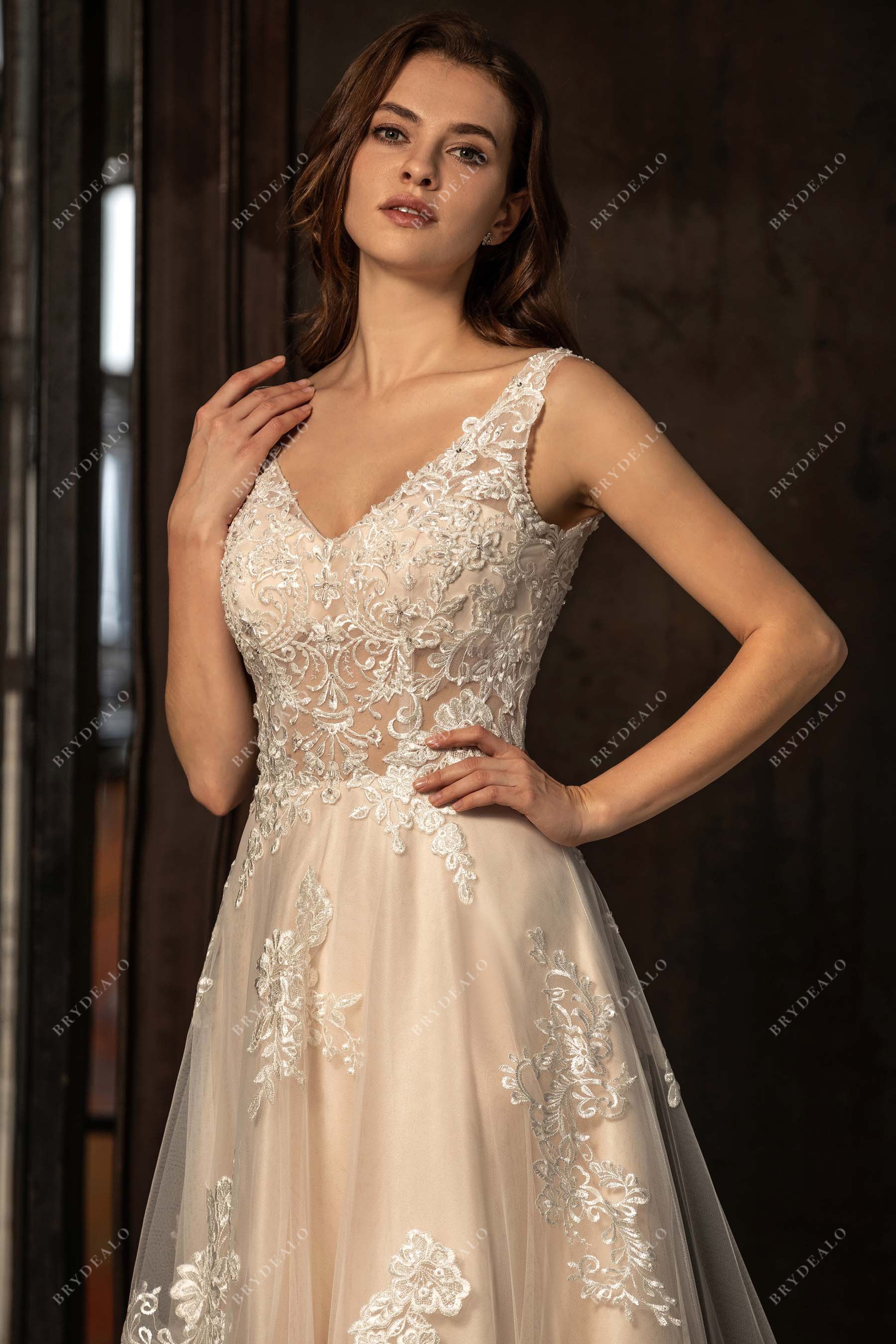 V-neck sleeveless lace bridal dress