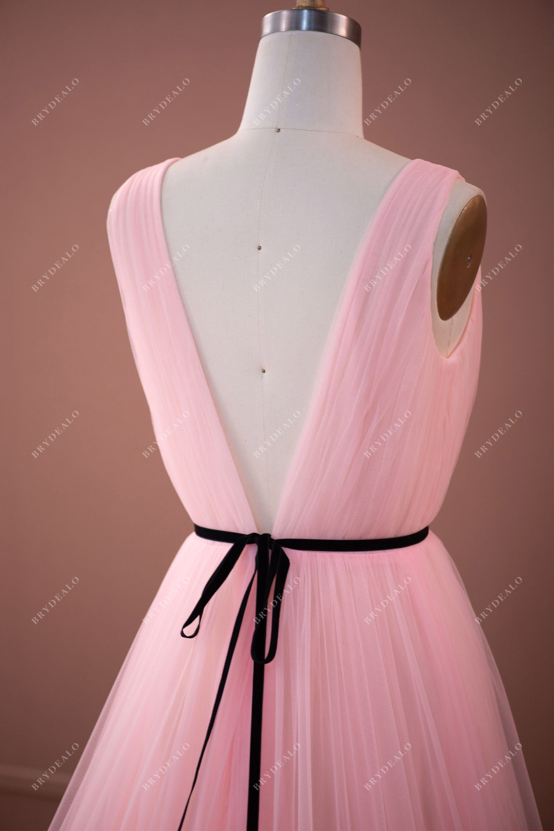 baby pink V-back tiered tulle formal dress with black sash