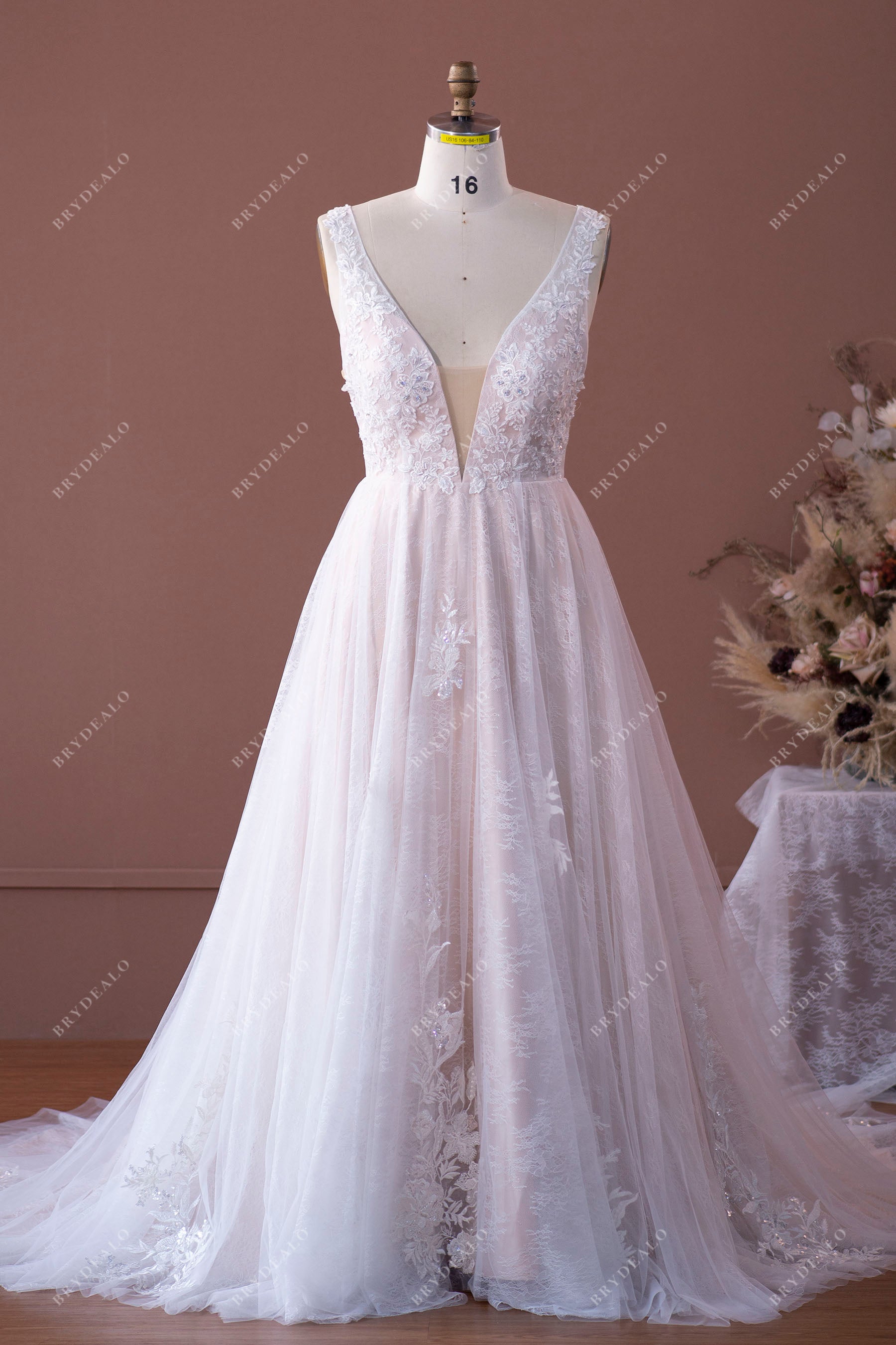 beaded floral lace plunging A-line wedding gown