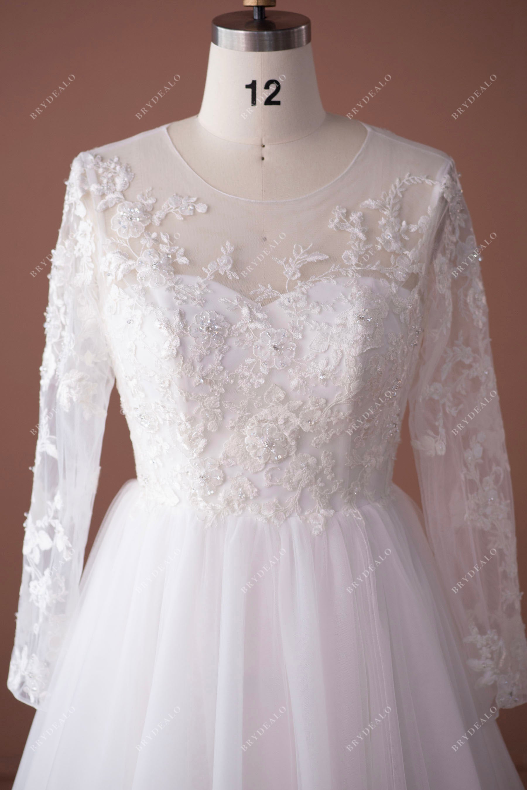 beaded flower long sleeved wedding dress