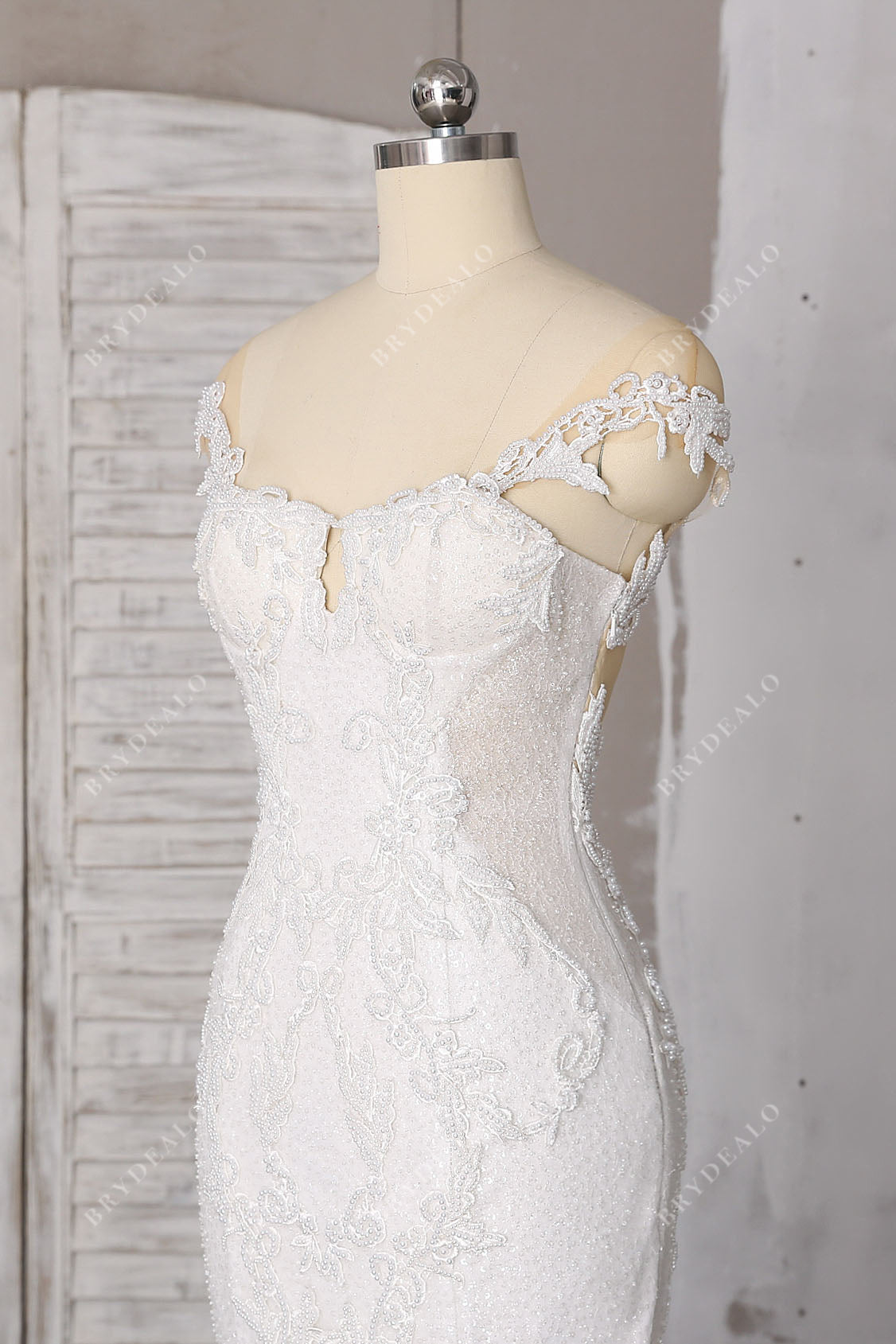 beaded off-shoulder drop sleeved bridal gown