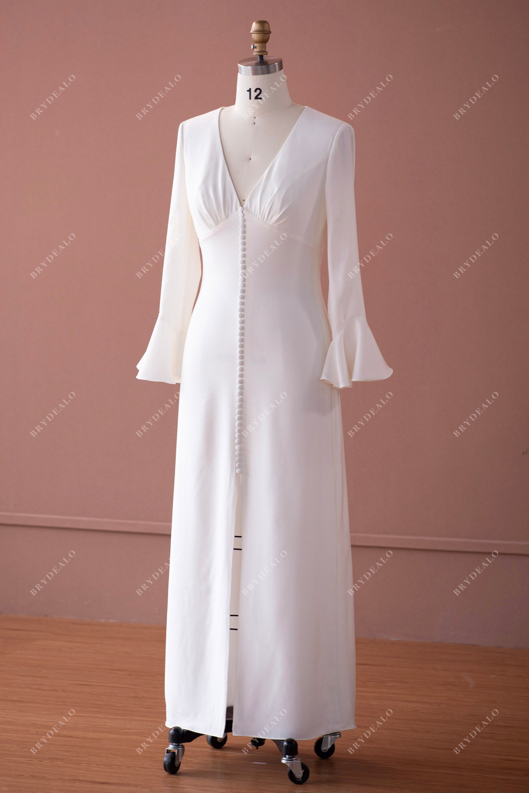 bell sleeved satin wedding dress