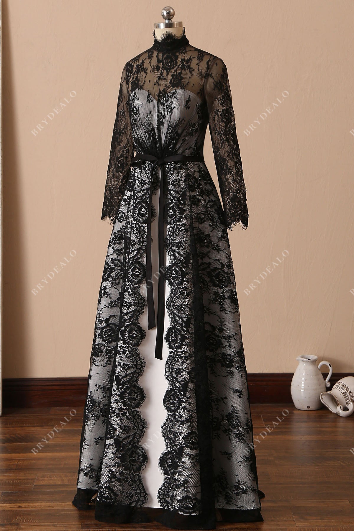 black lace overlaid ivory satin wedding dress