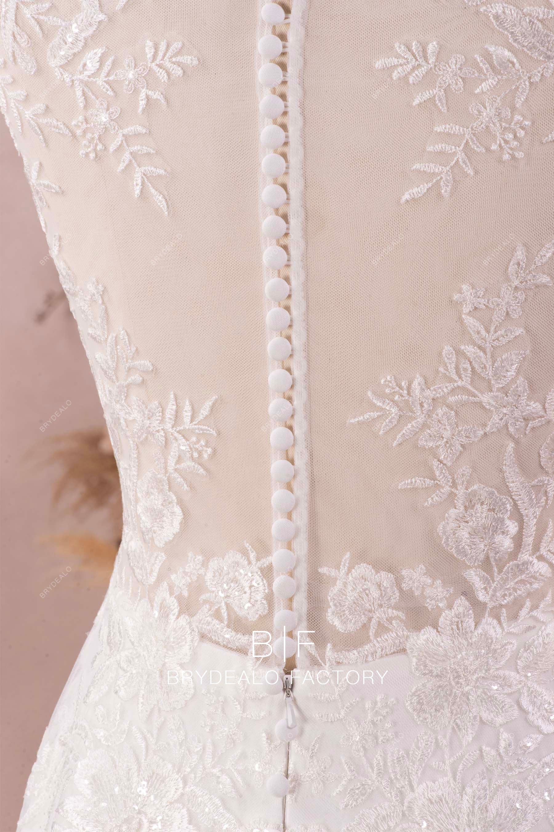 buttoned lace back wedding dress
