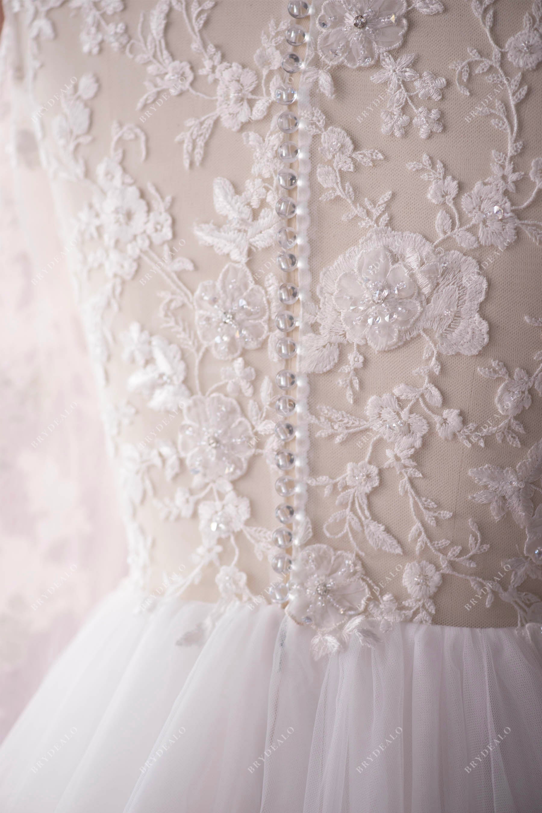 buttoned lace back wedding dress