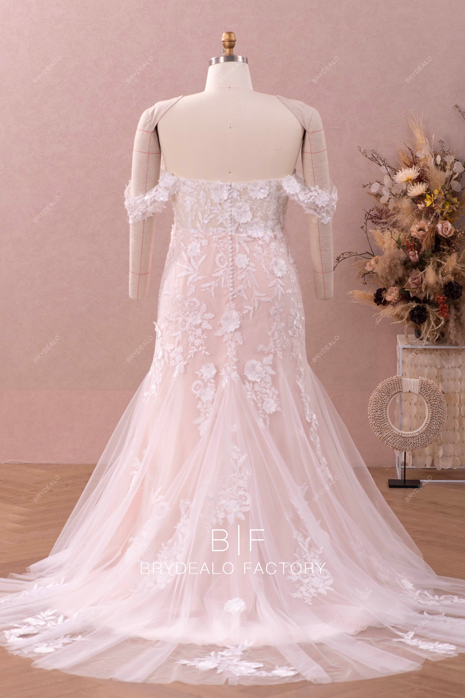 court train illusion buttoned back bridal gown