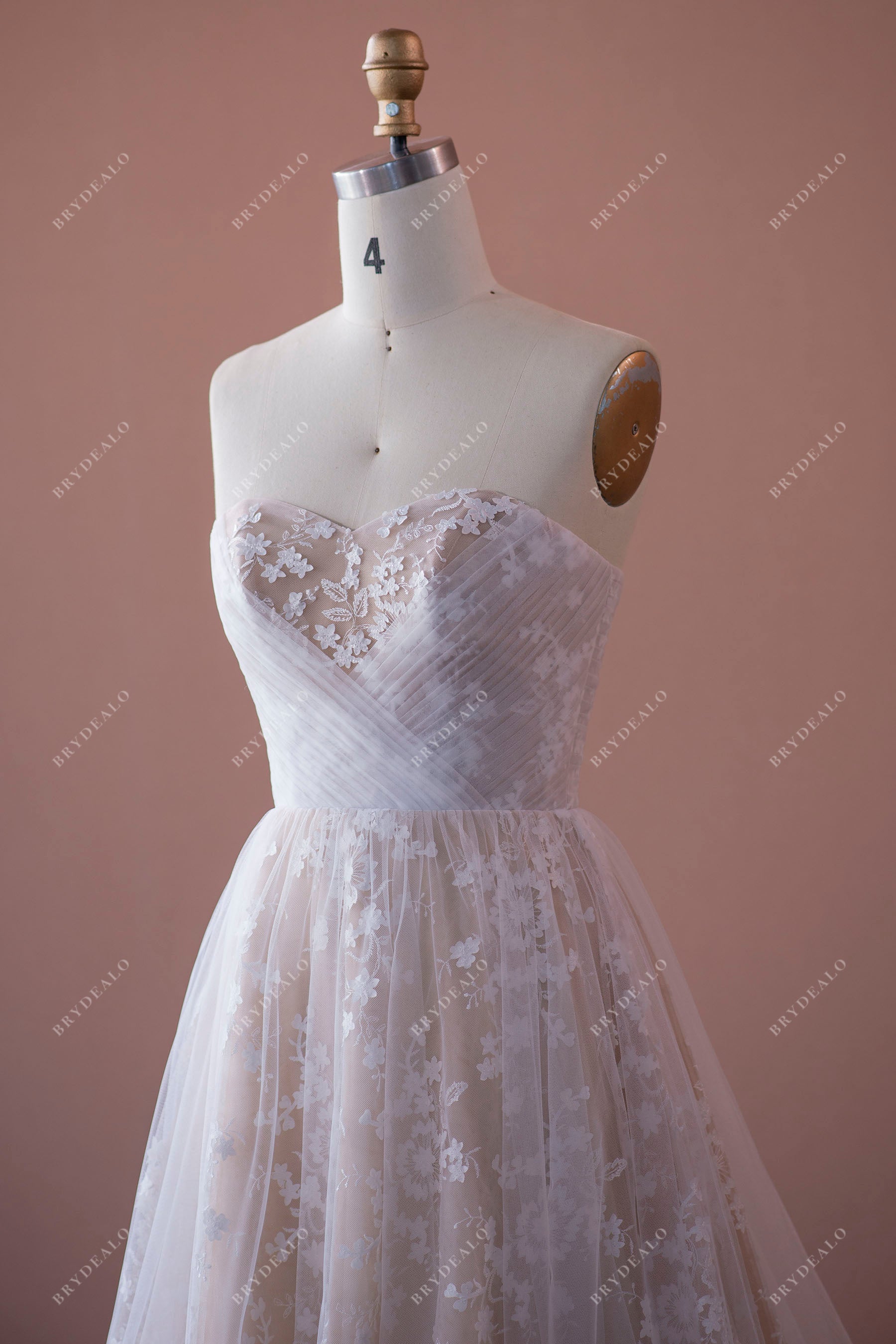 crisscross pleated sweetheart off-shoulder wedding gown