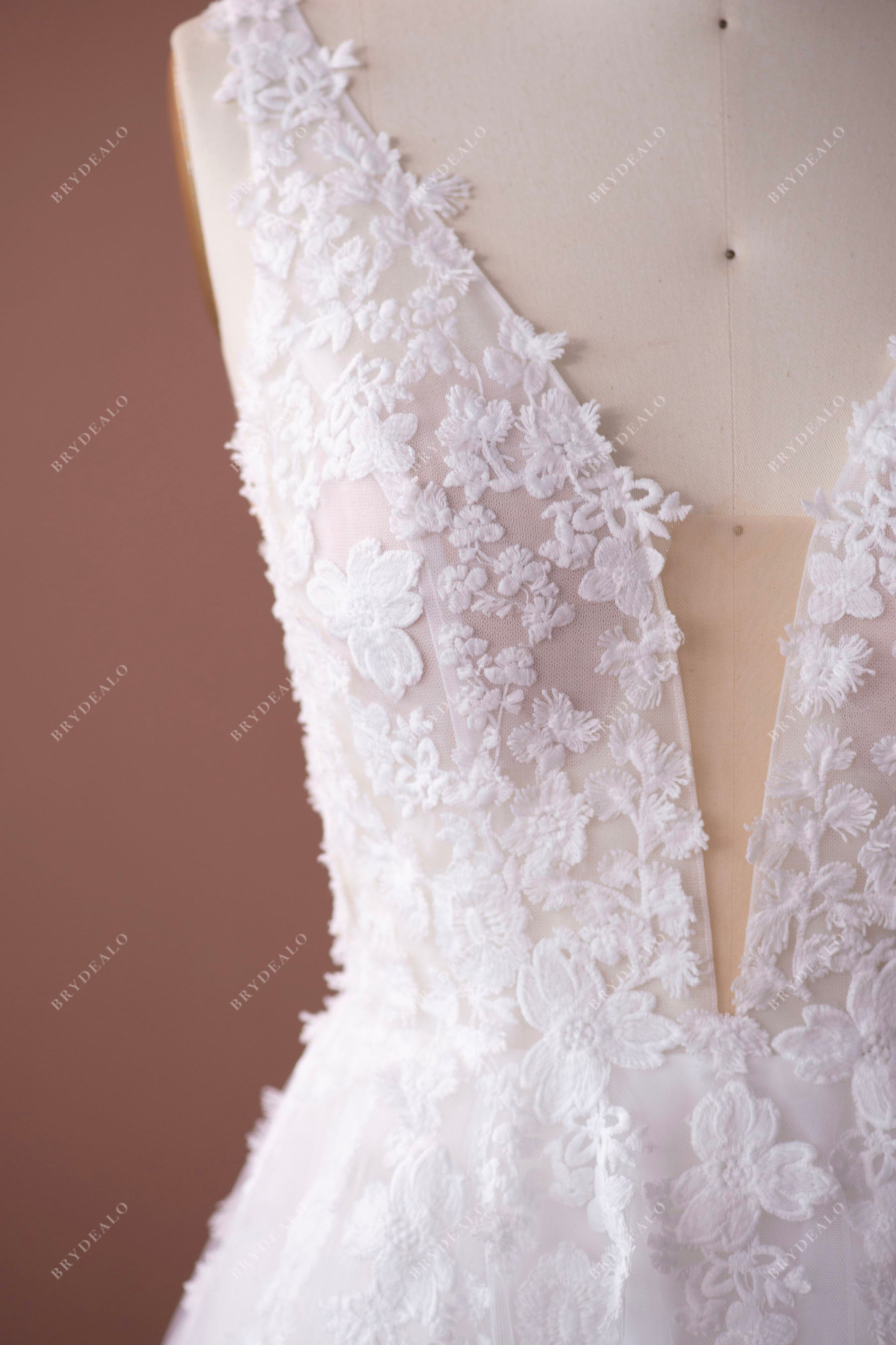 deep v-neck lace bridal gown