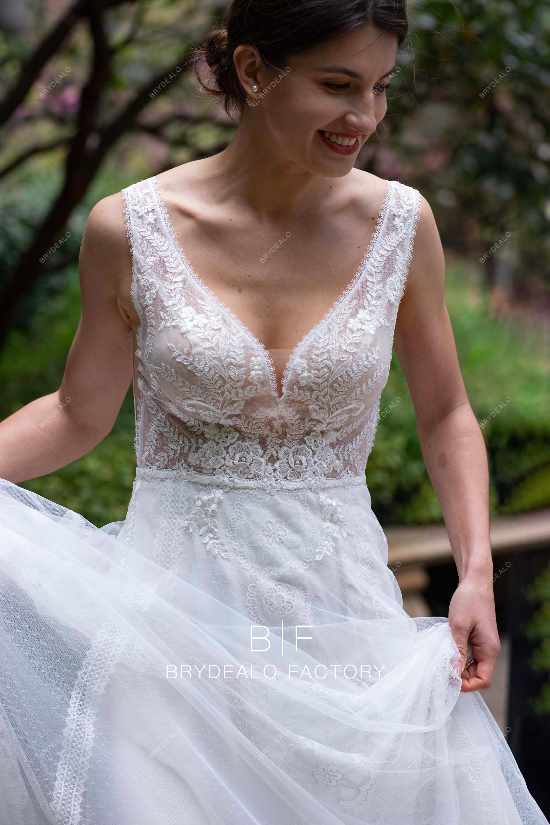 delicate lace plunging wedding dress
