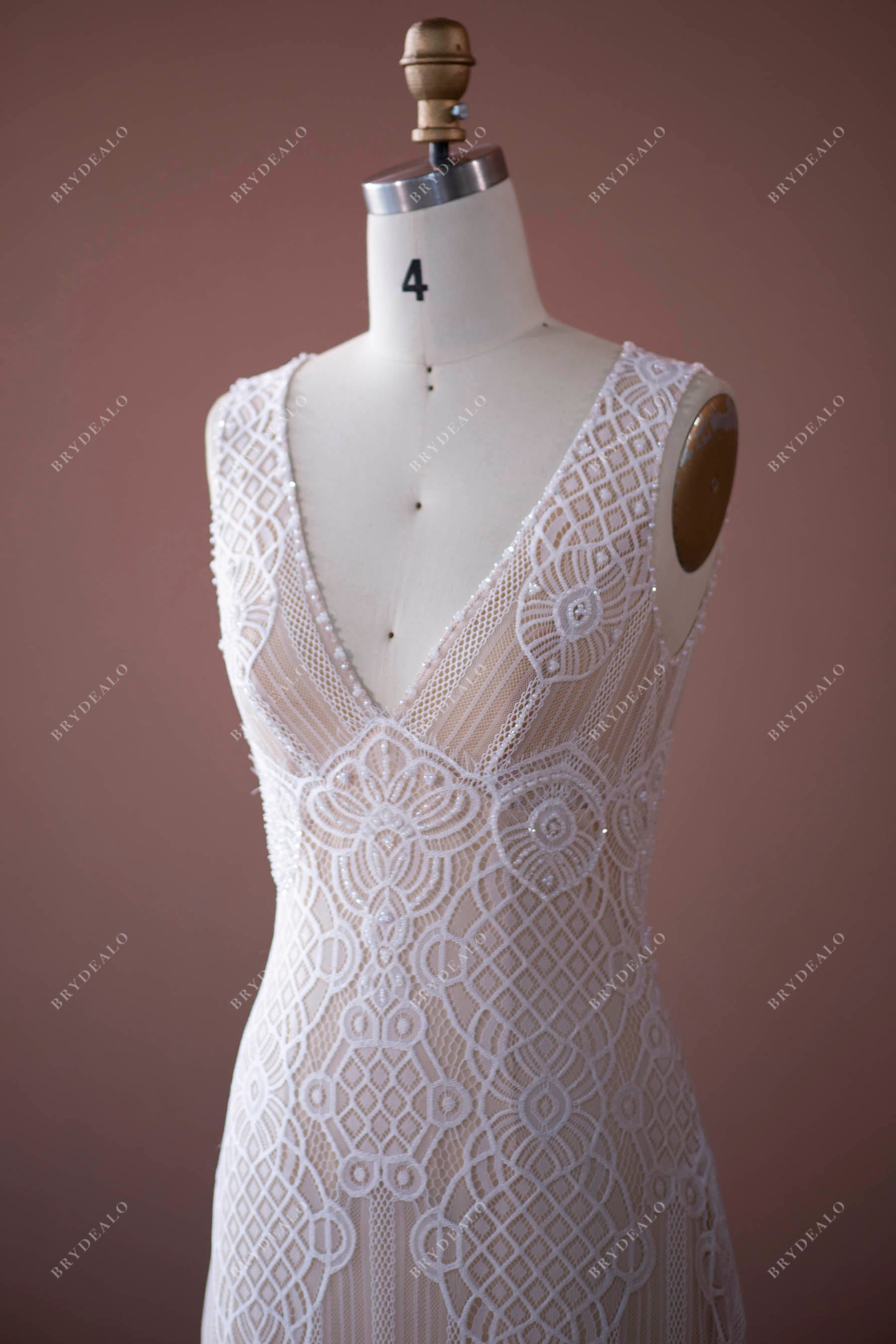 V-neck lace sleeveless bridal gown