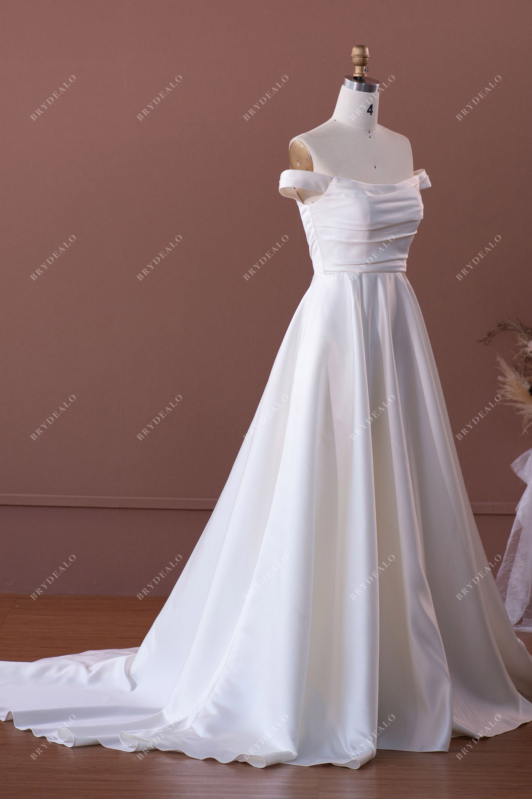elegant satin off-shoulder A-line bridal gown