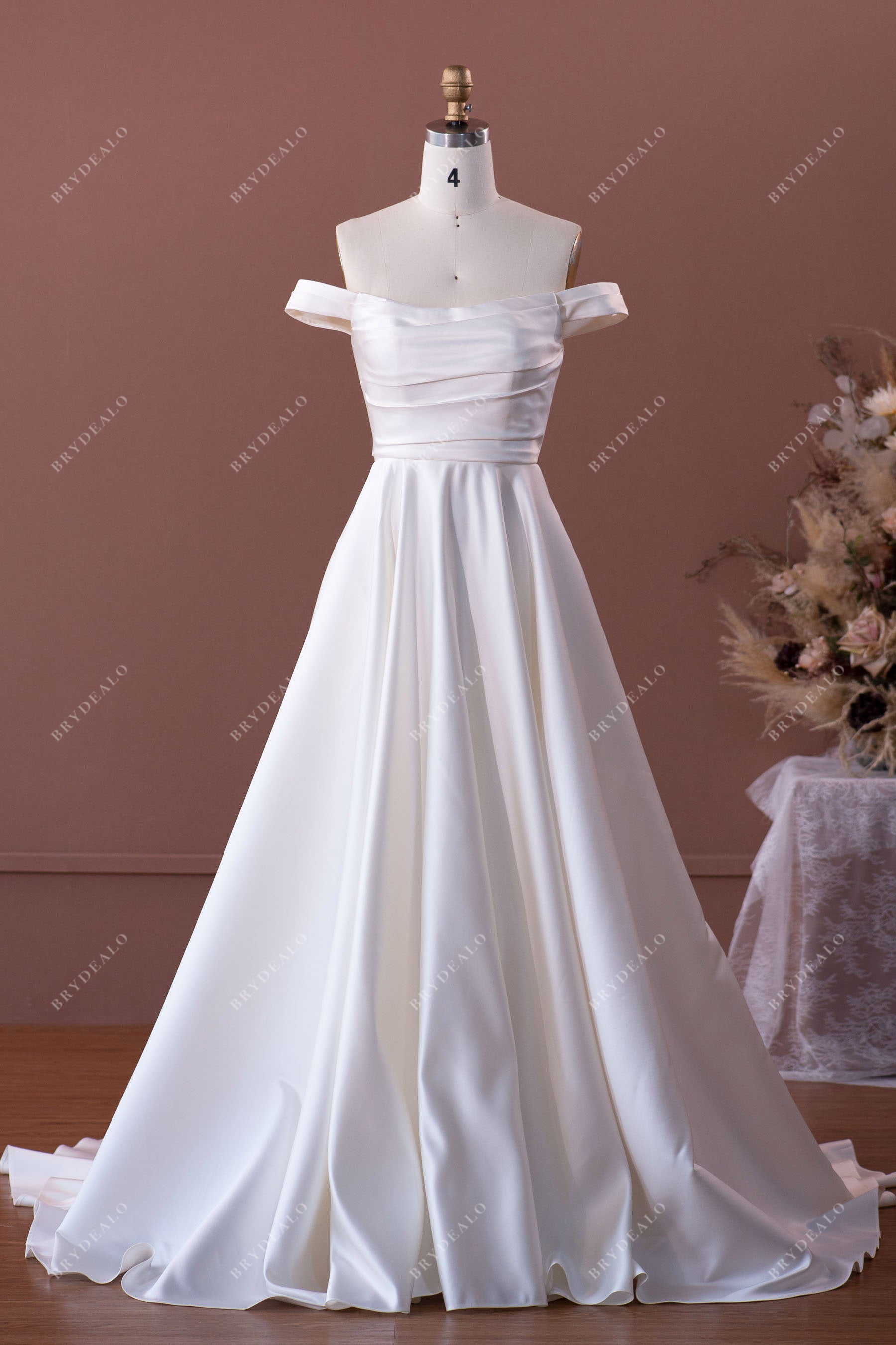 elegant satin off-shoulder A-line wedding dress
