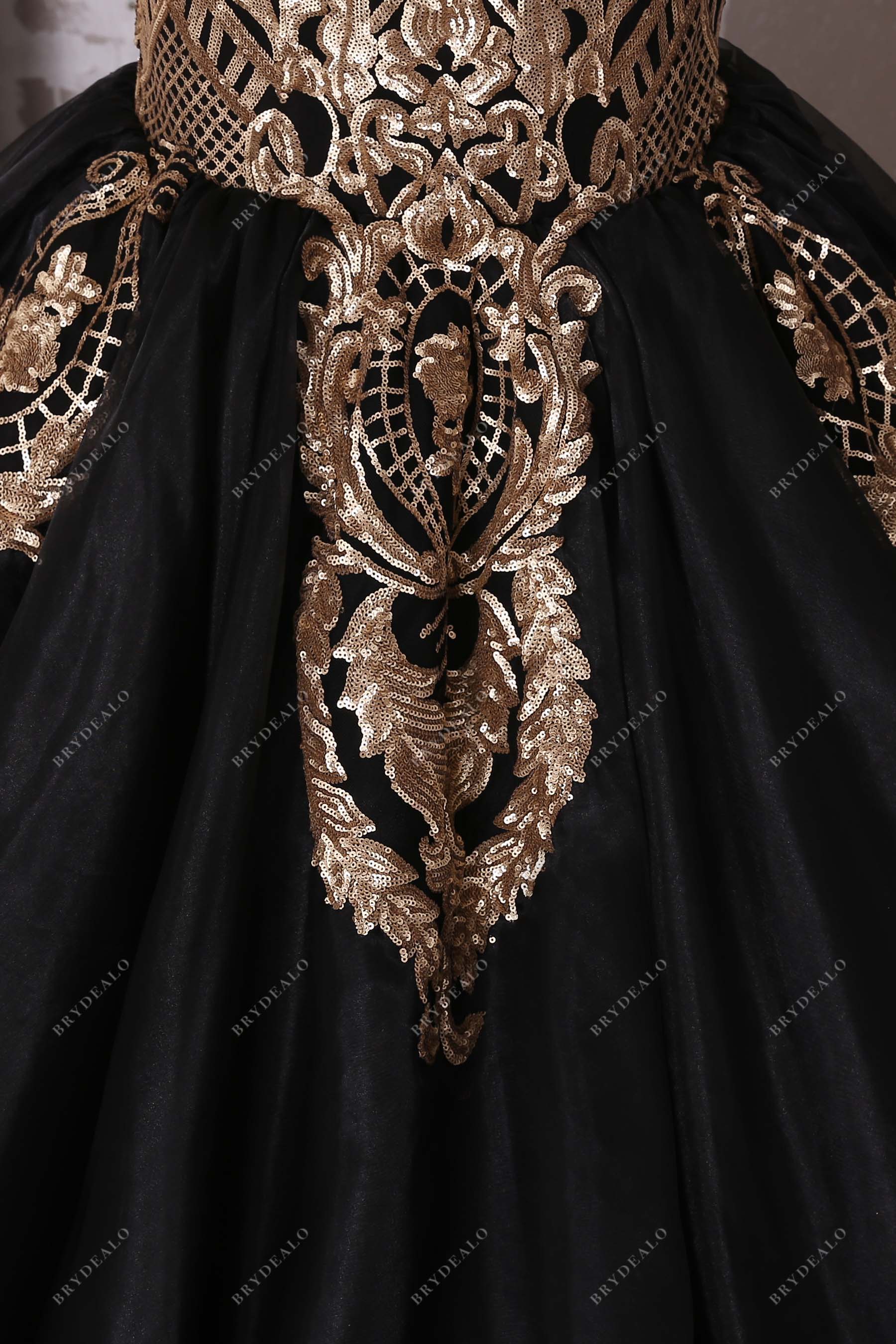 gold sequined black trumpet dress