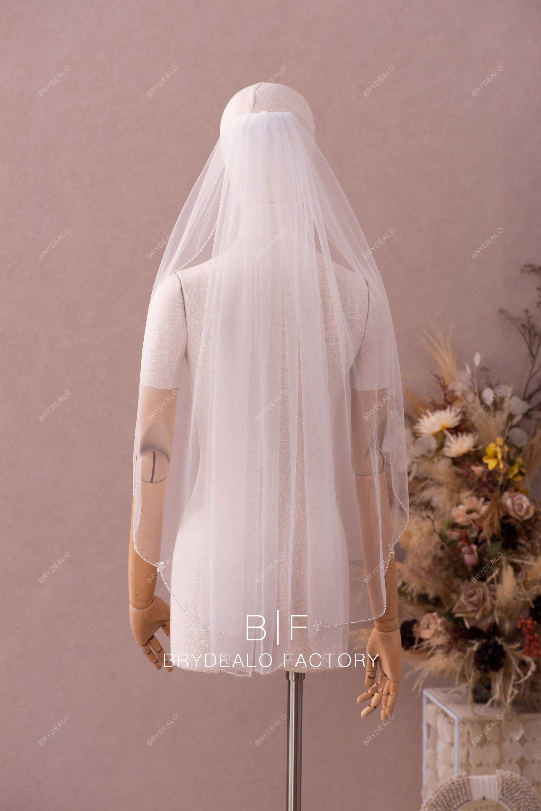 hip length hand-sewn beaded bridal veil