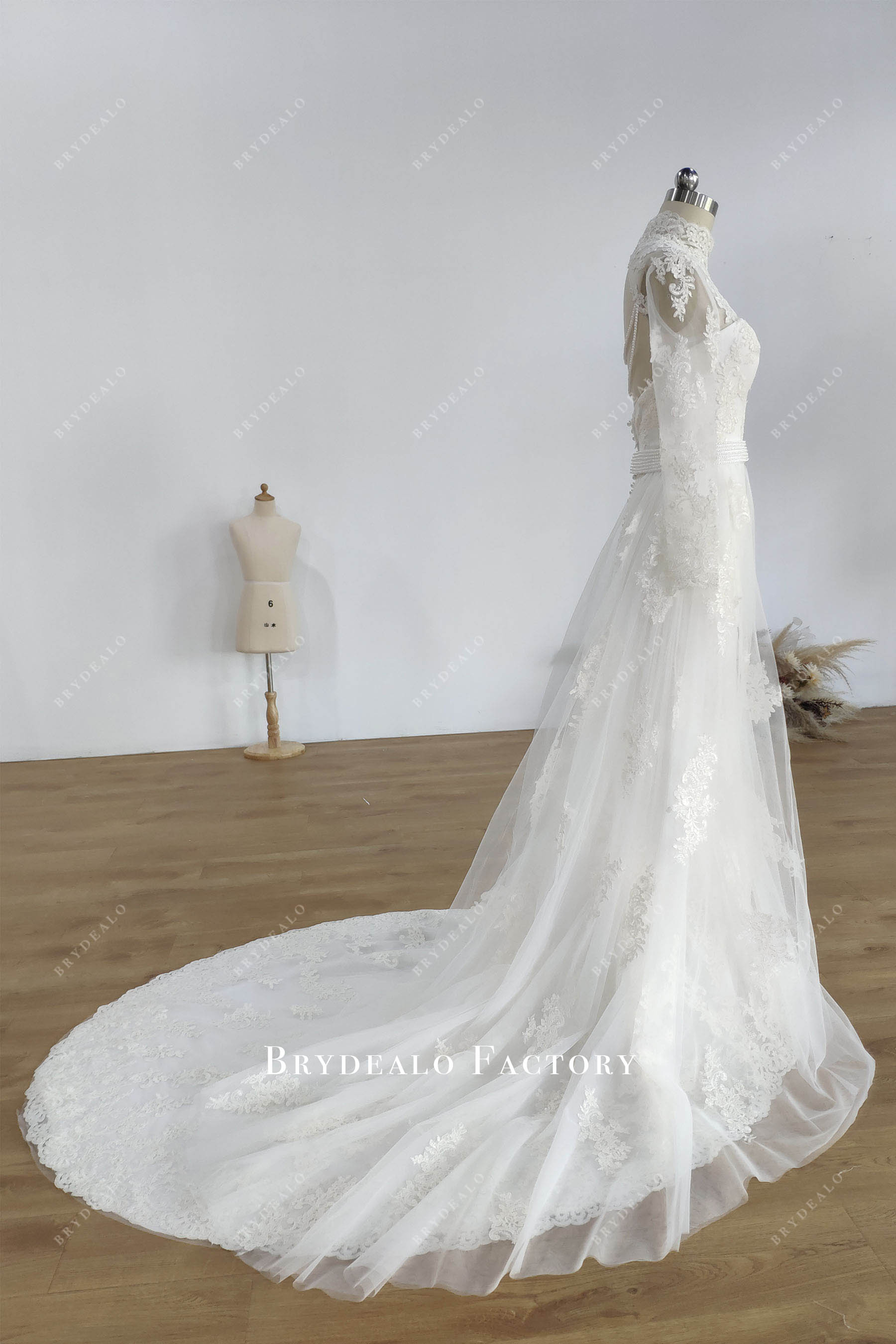 illusion long sleeve mermaid bridal gown