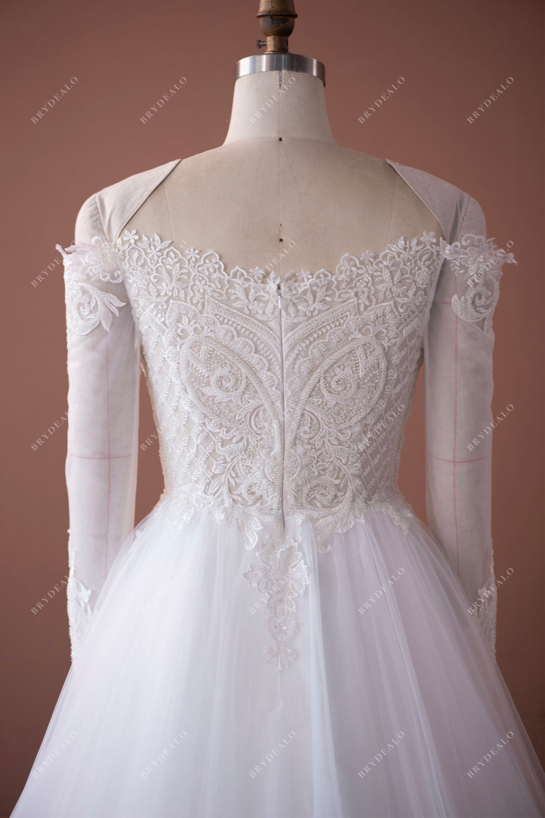 illusion sleeved lace wedding gown