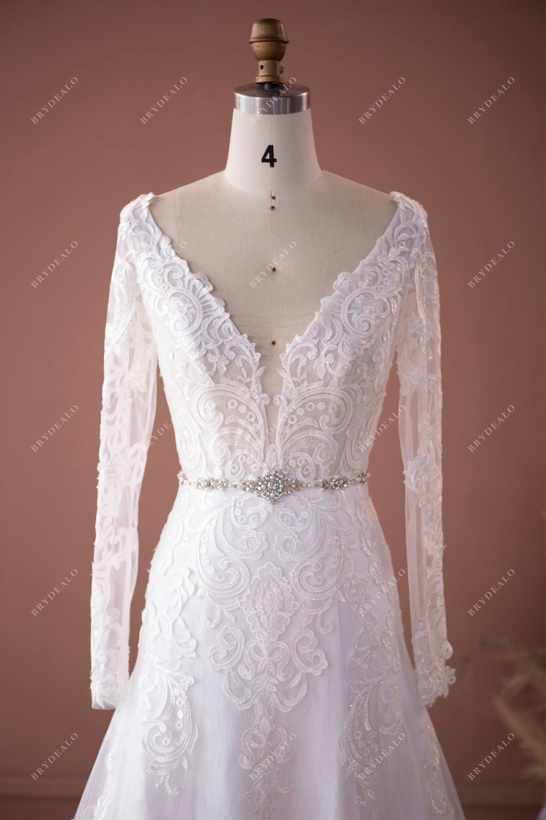illusion sleeved plunging lace fit and flare long wedding dress