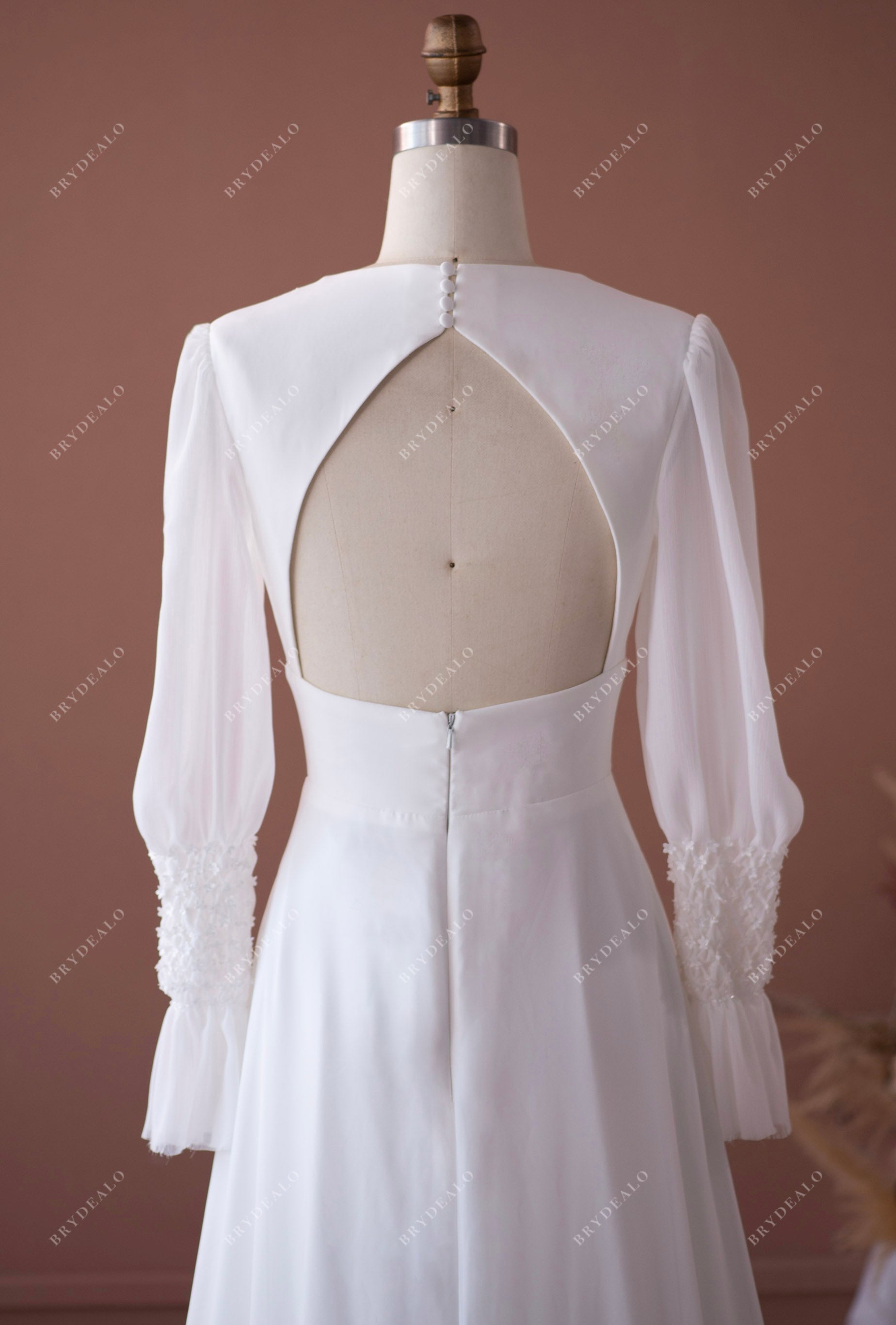 keyhole back sleeved wedding dress