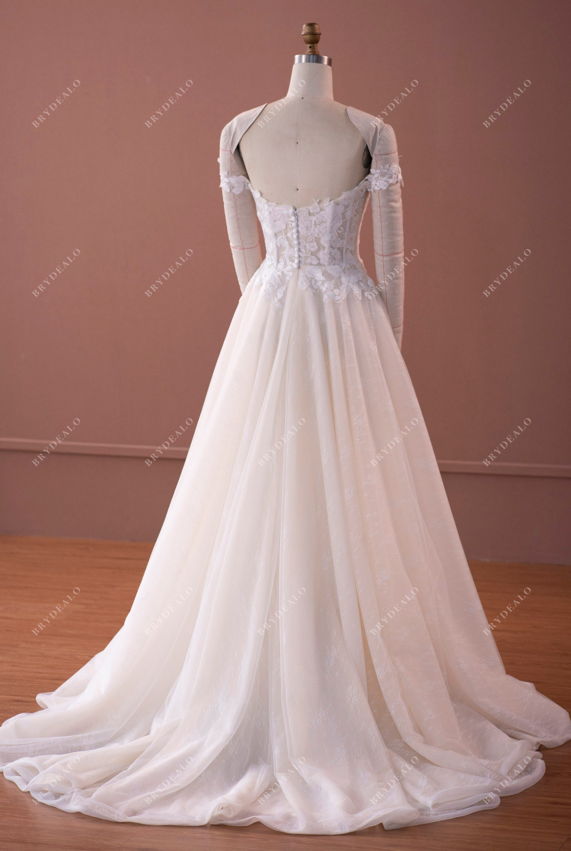 off shoulder boned lace bodice A-line wedding dress with court train