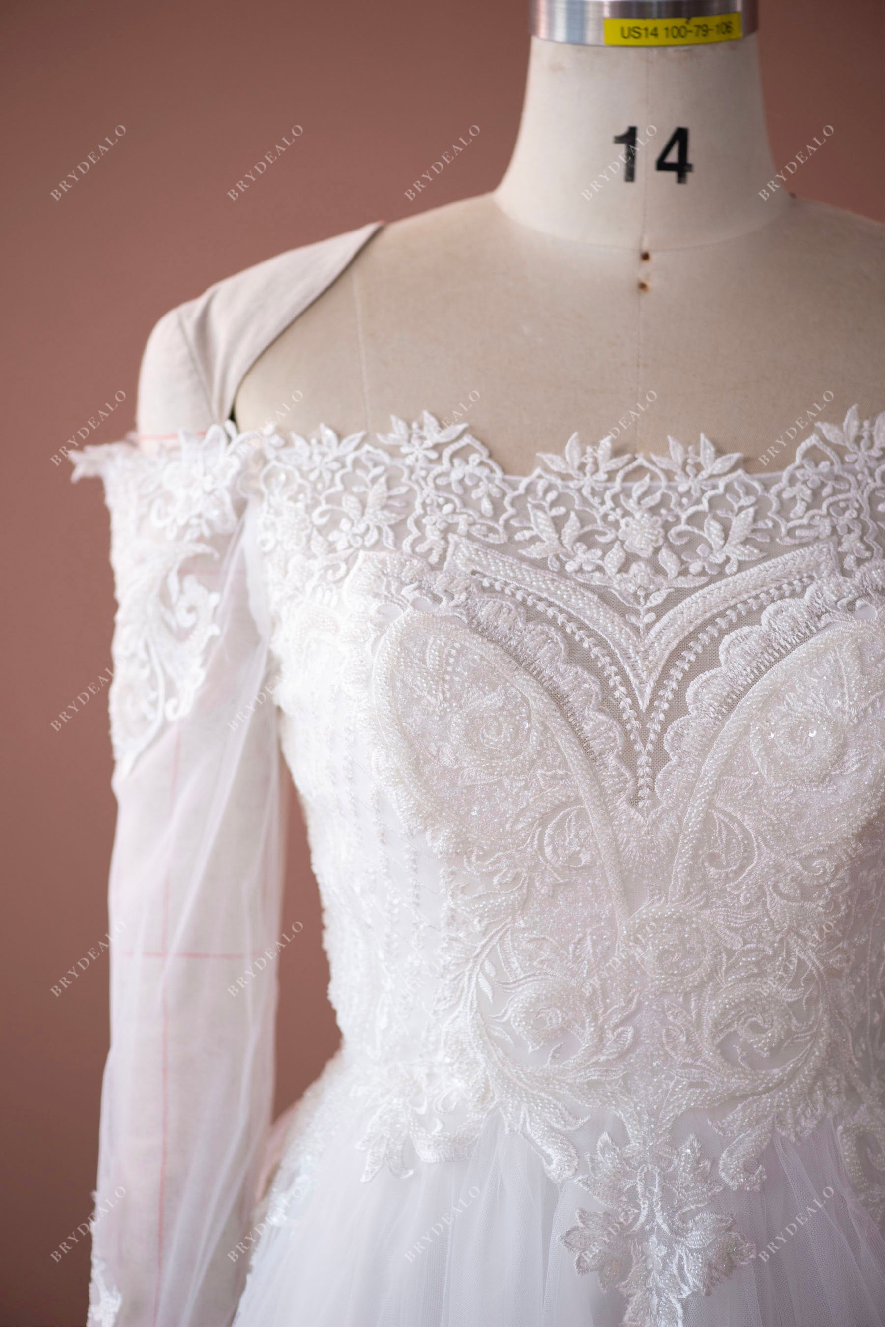 off shoulder long sleeve wedding dress