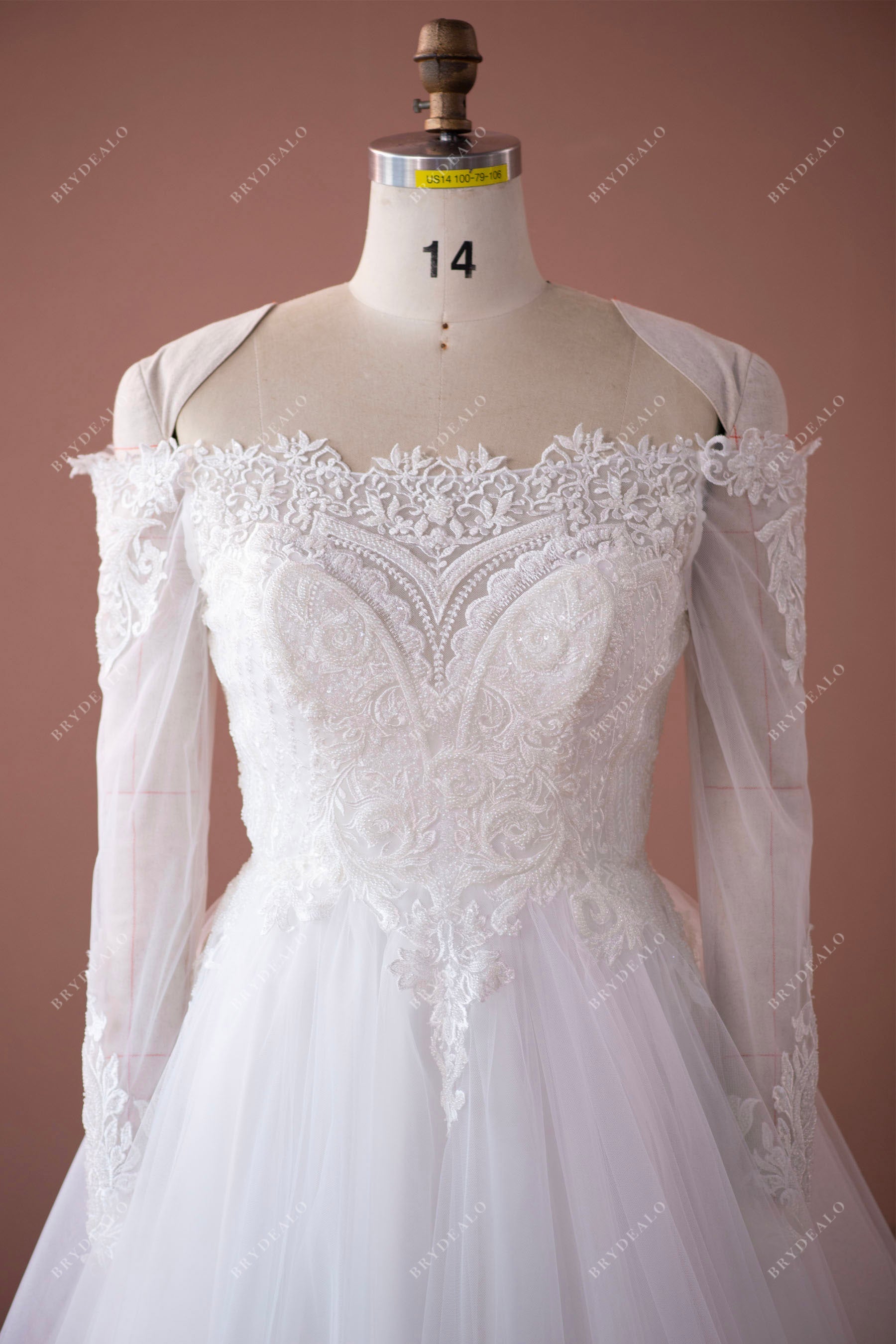 off shoulder sleeved beaded lace wedding dress