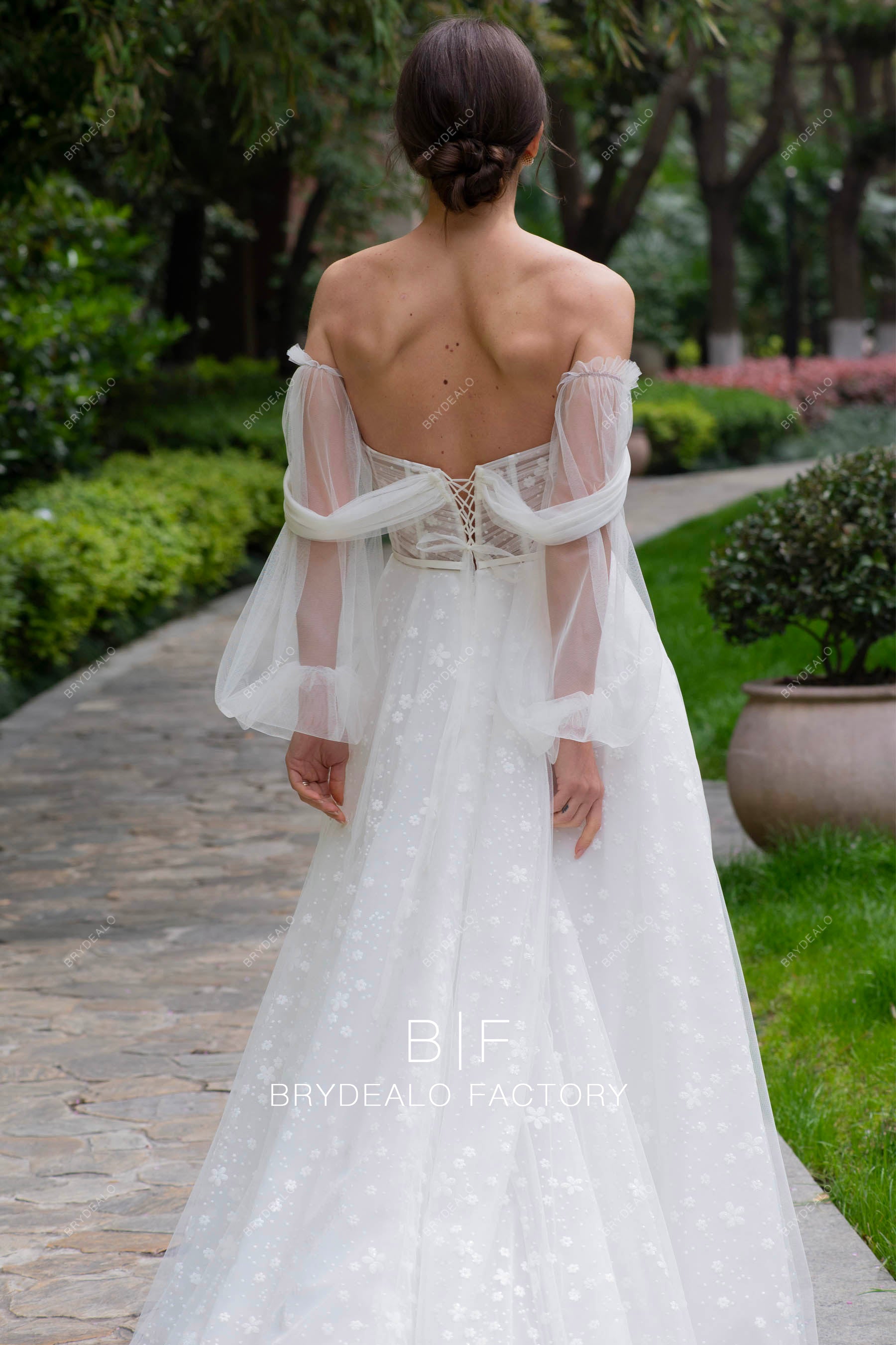 off shoulder sleeved dreamy corset wedding dress