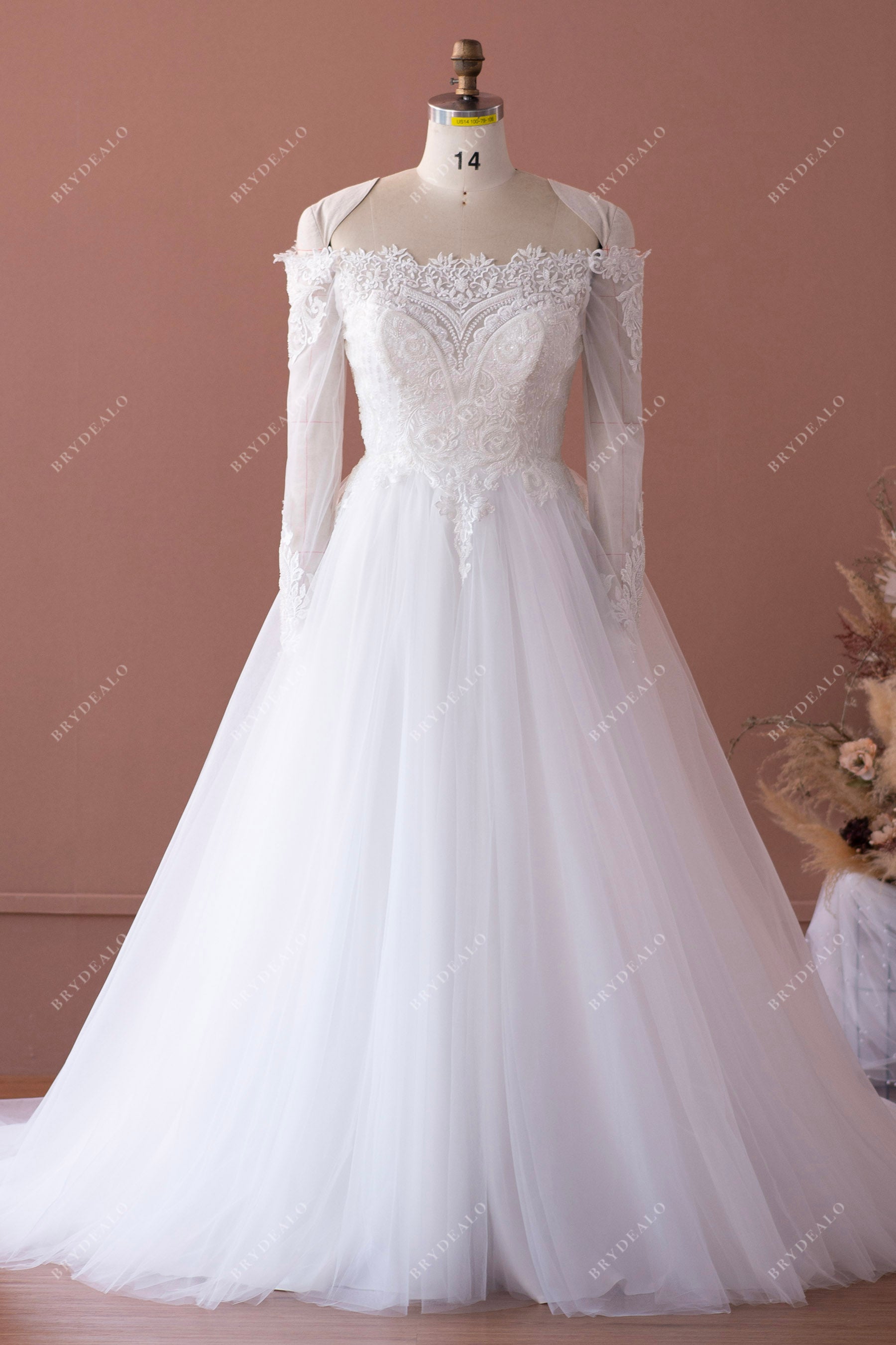 off shoulder sleeved lace wedding dress