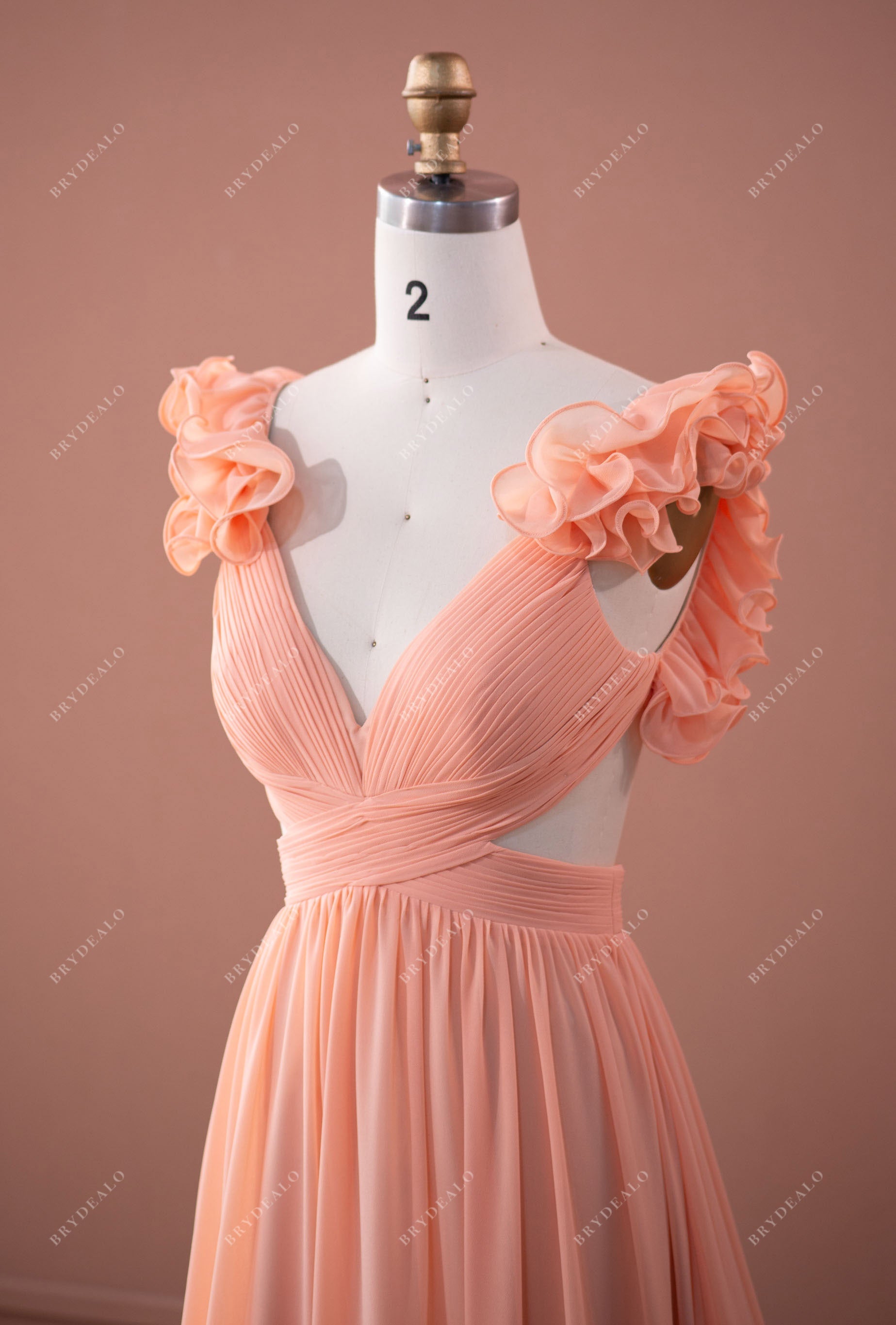 peach pink plunging cutout flowing formal gown
