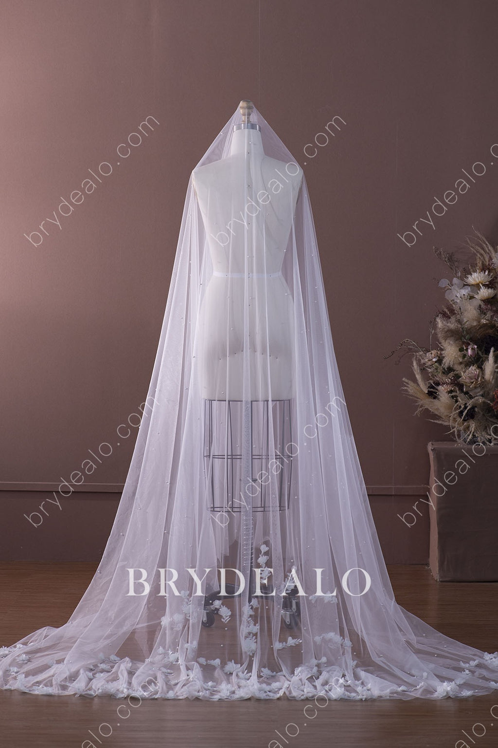 https://brydealofactory.com/cdn/shop/products/pearls-3D-flowers-chapel-length-bridal-veil.jpg?v=1644142362&width=1024