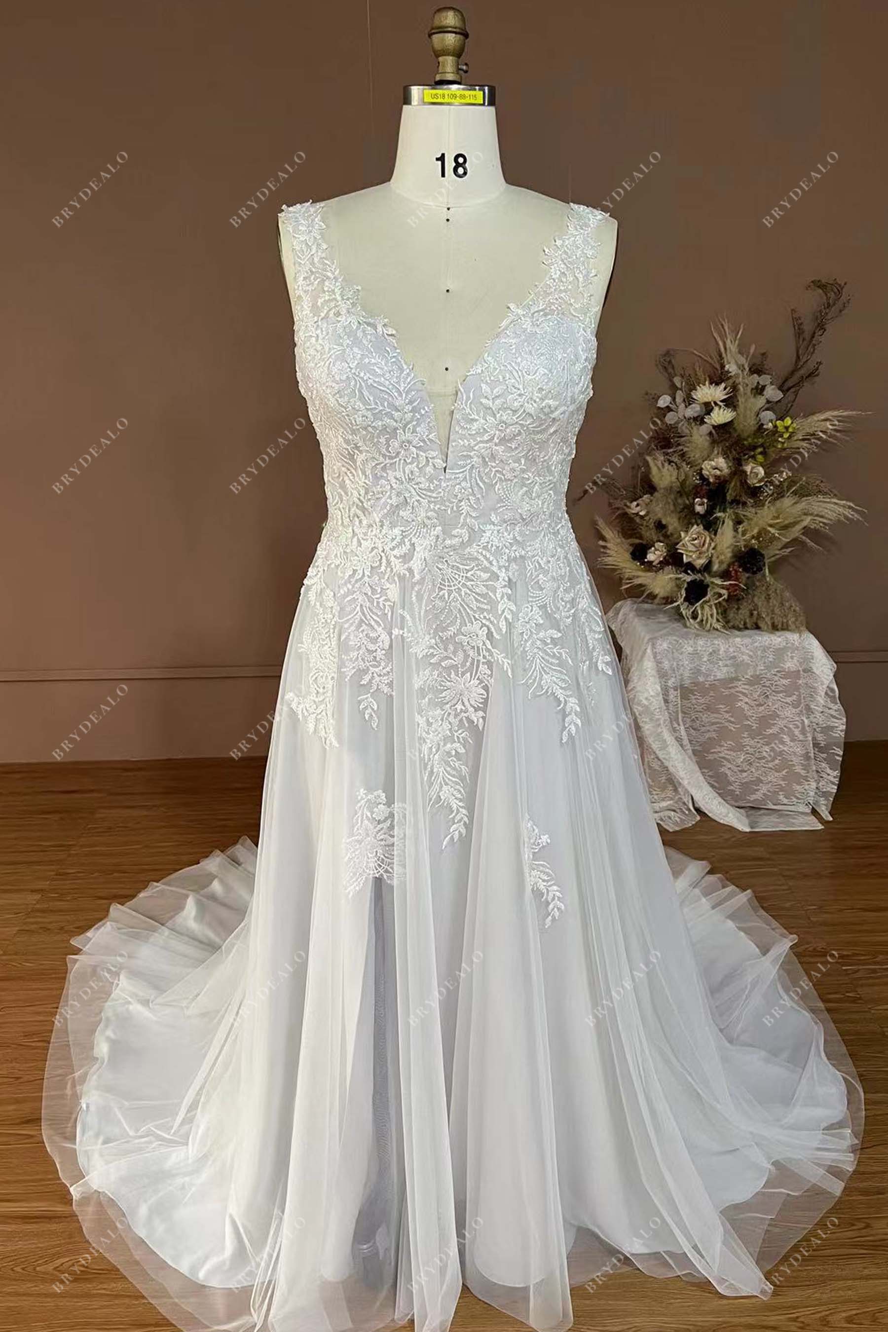 plunging v-neck lace overlaid silver A-line wedding dress