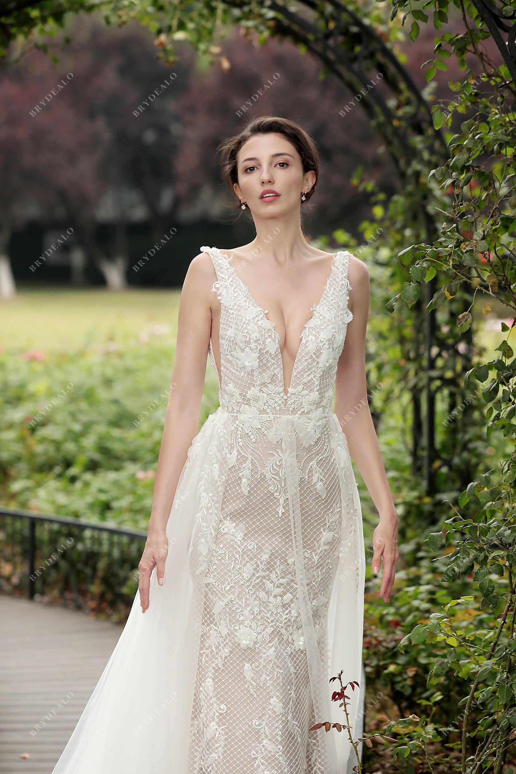 plunging V-neck lace overskirt bridal gown