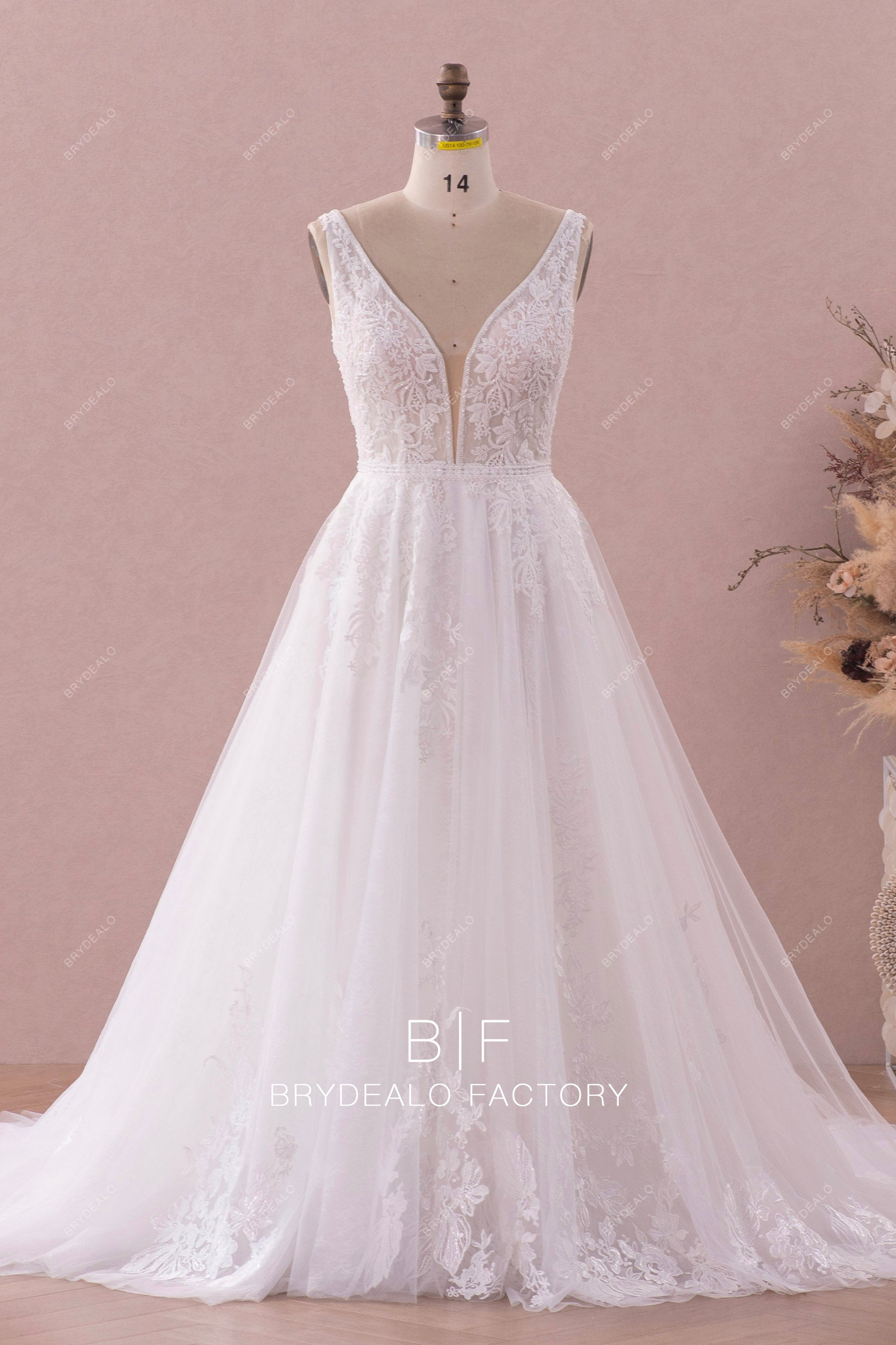 plunging beaded lace A-line wedding dress