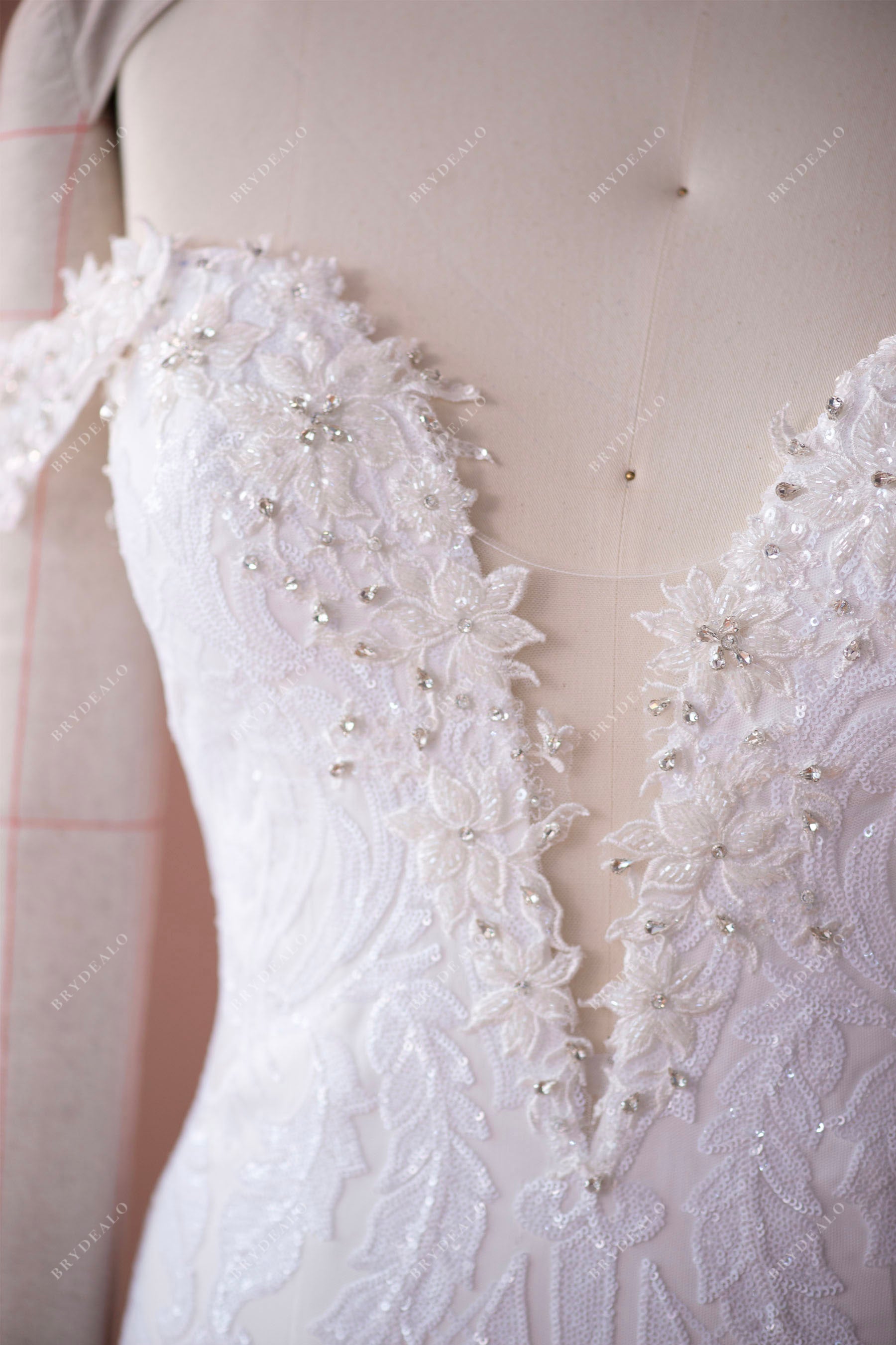 plunging beaded lace wedding gown