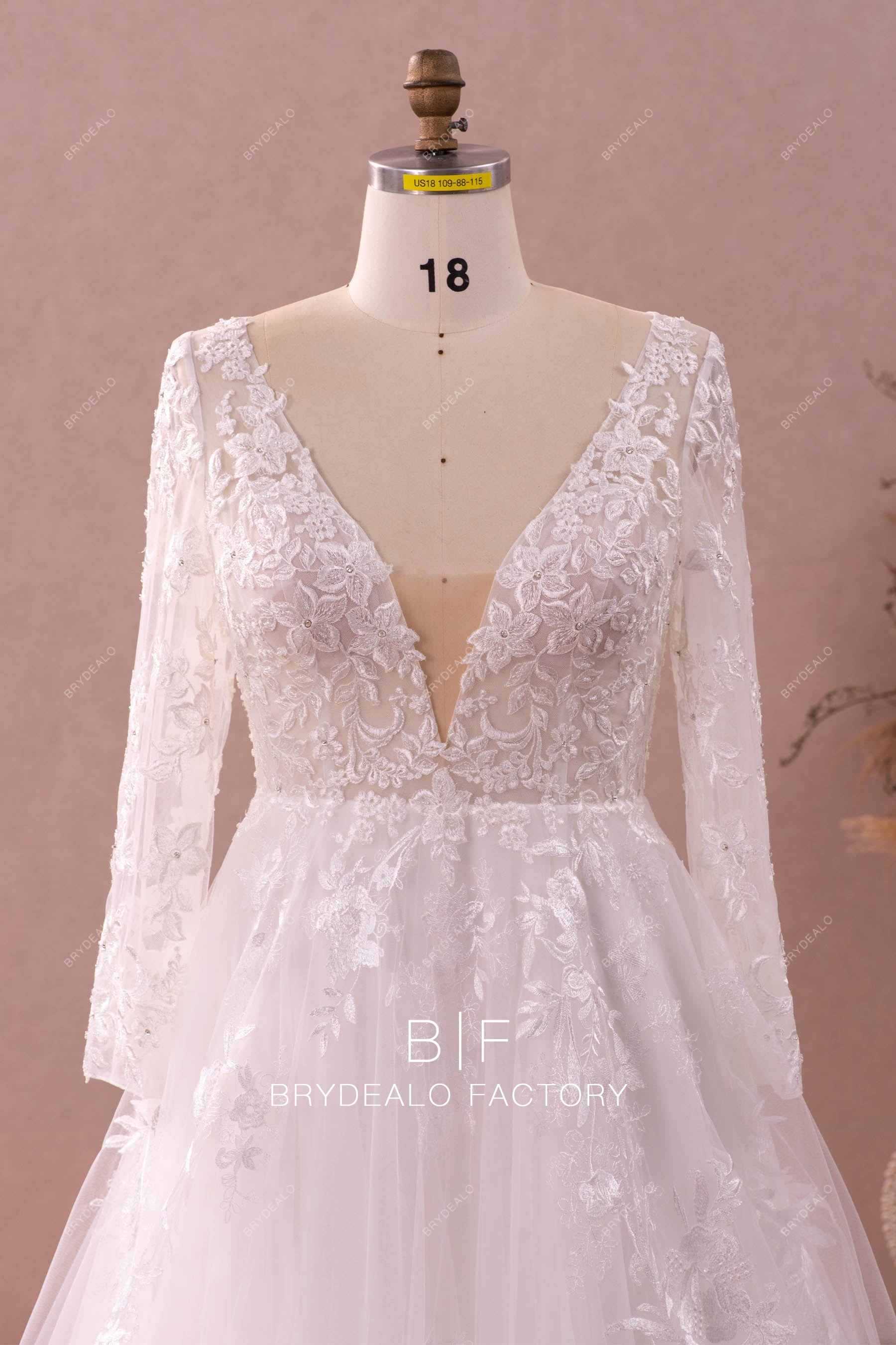 plus size plunging sleeved lace wedding dress