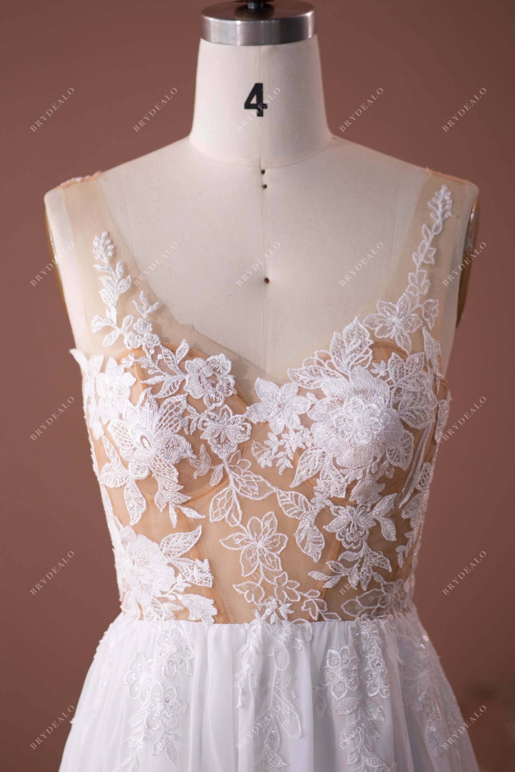 plunging neck sheer lace bridal dress