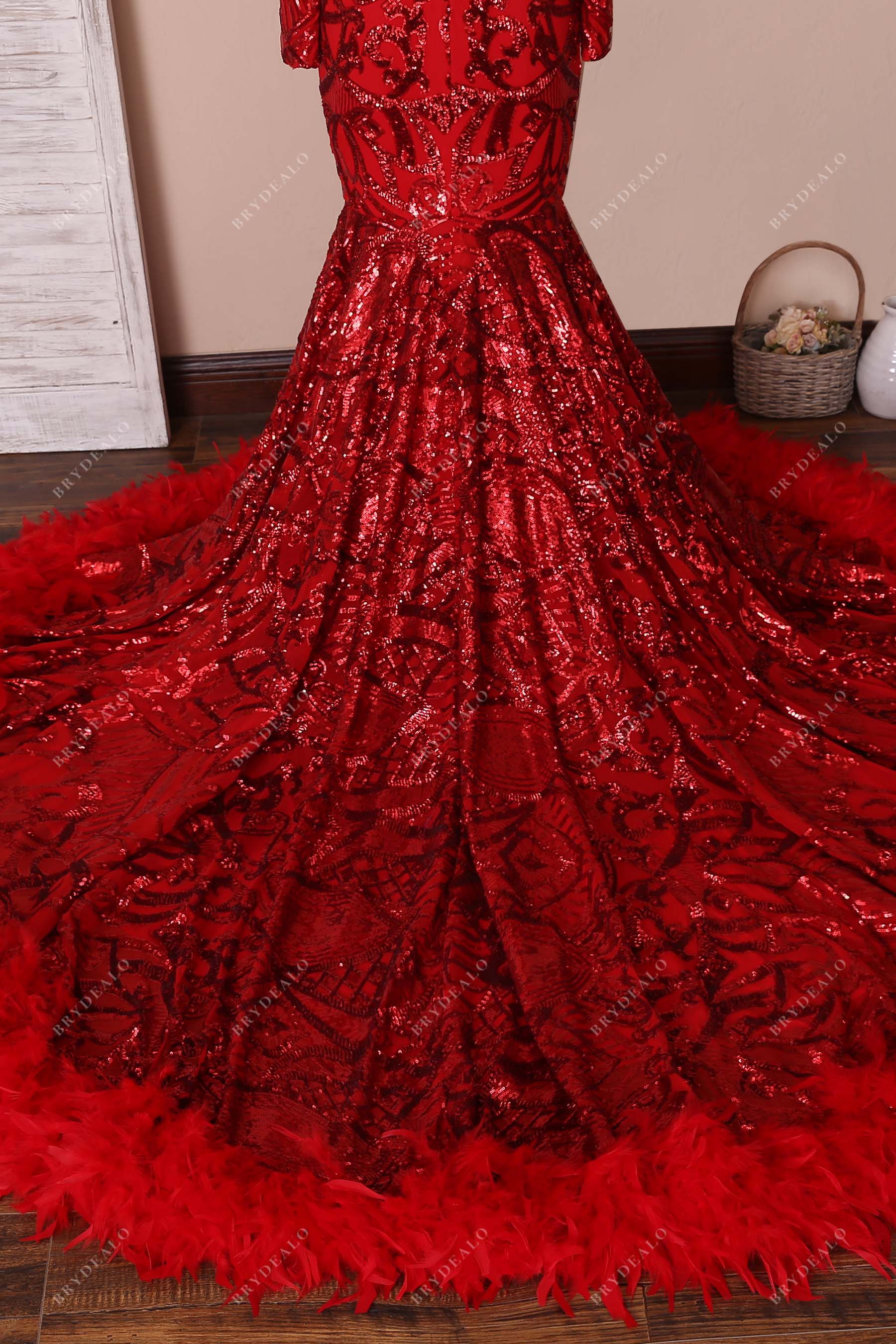 red feathers long train sequin gown