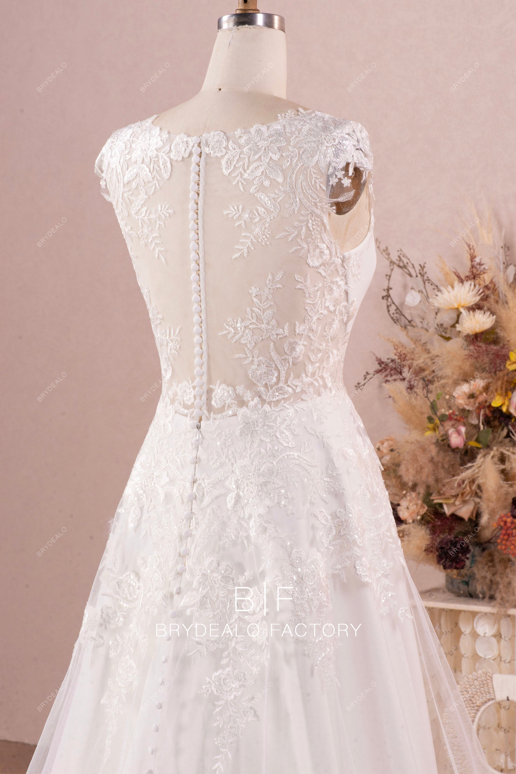 sheer cap sleeve lace overskirt wedding dress